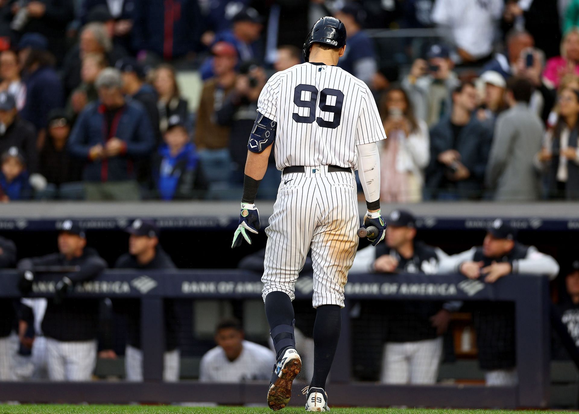 Aaron Judge #99 of the New York Yankees heads to the dugout after striking out