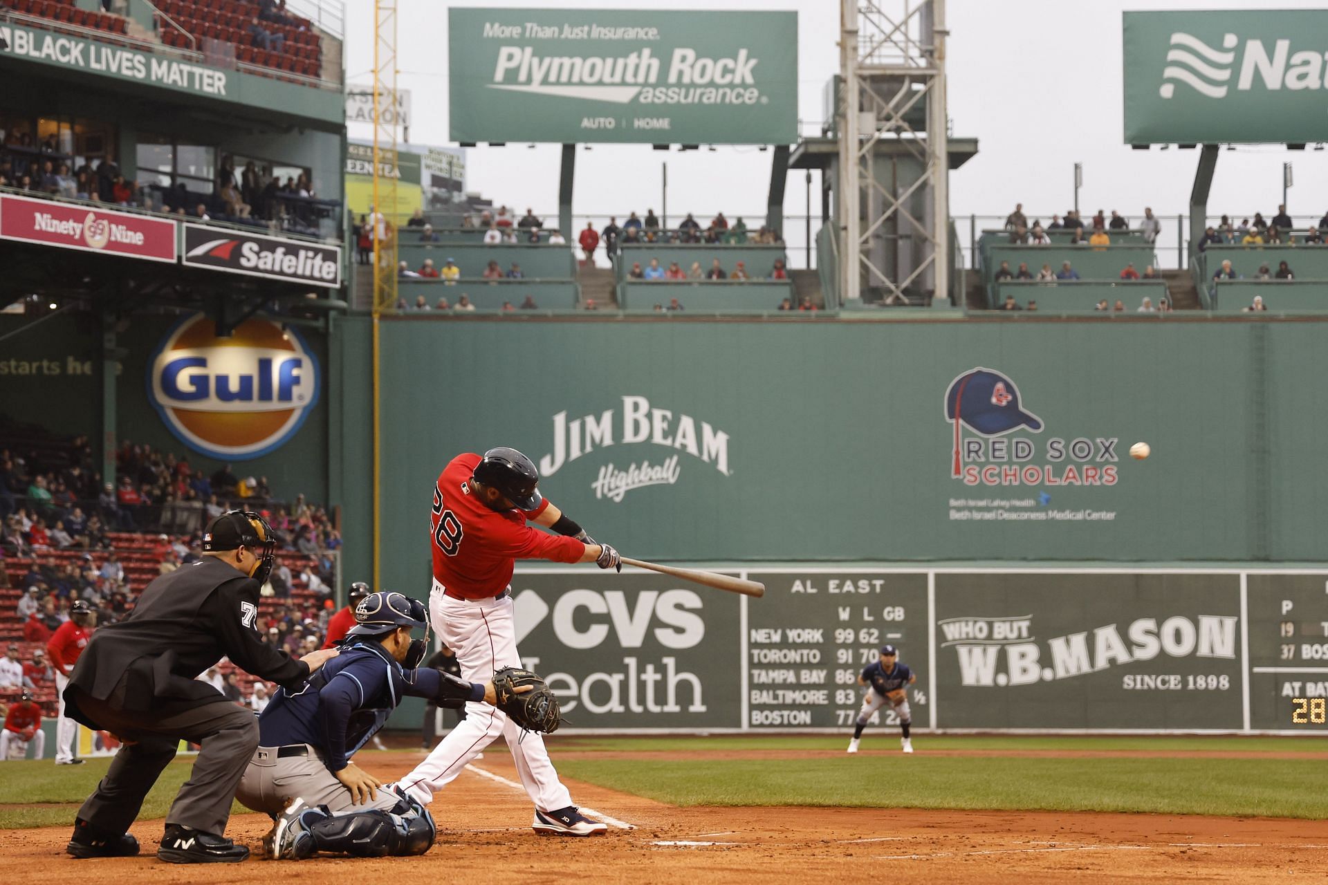J.D. Martinez of the Boston Red Sox connects on a home run against the Tampa Bay Rays at Fenway Park