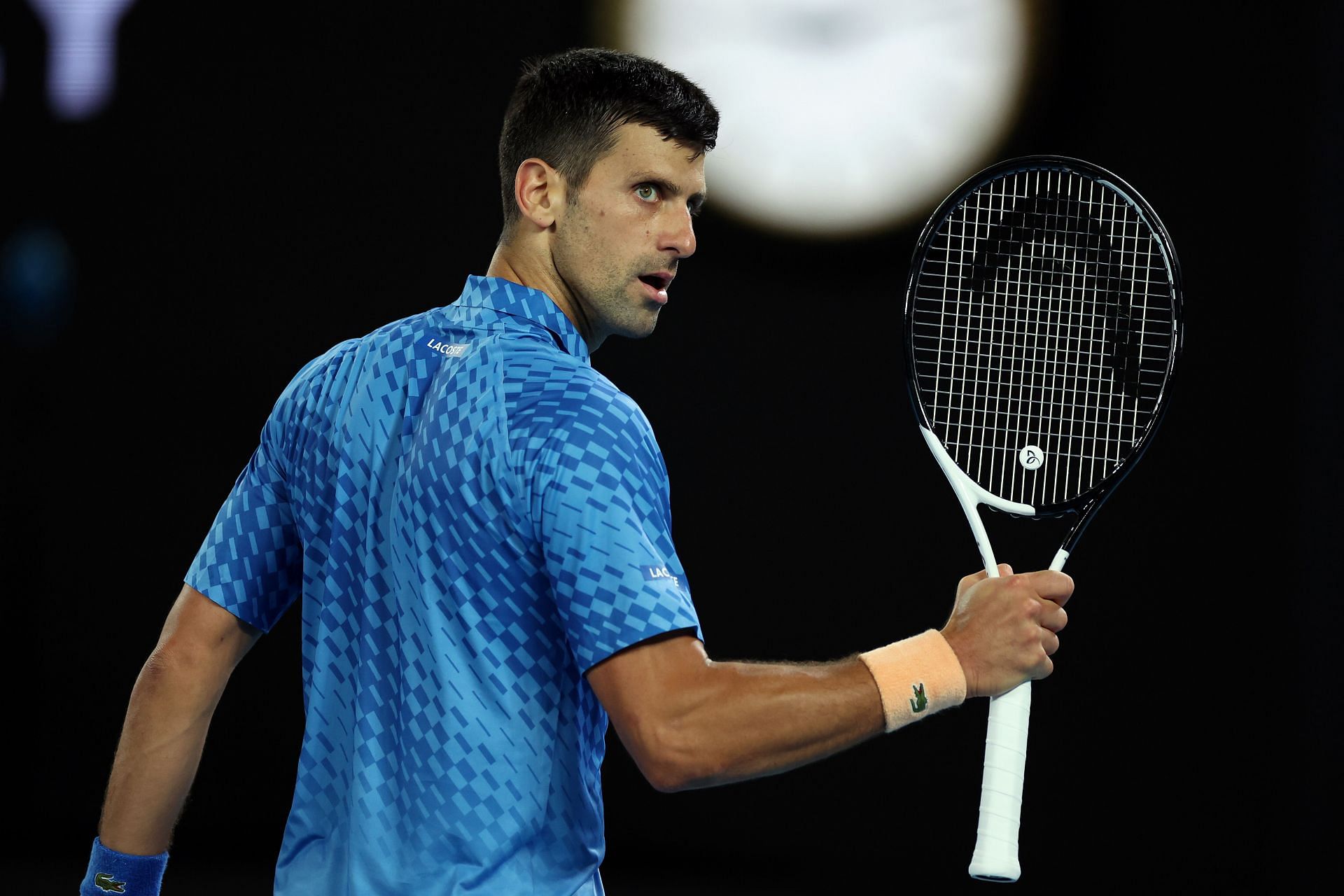 Novak Djokovic celebrates during his 2023 Australian Open 3rd round match.