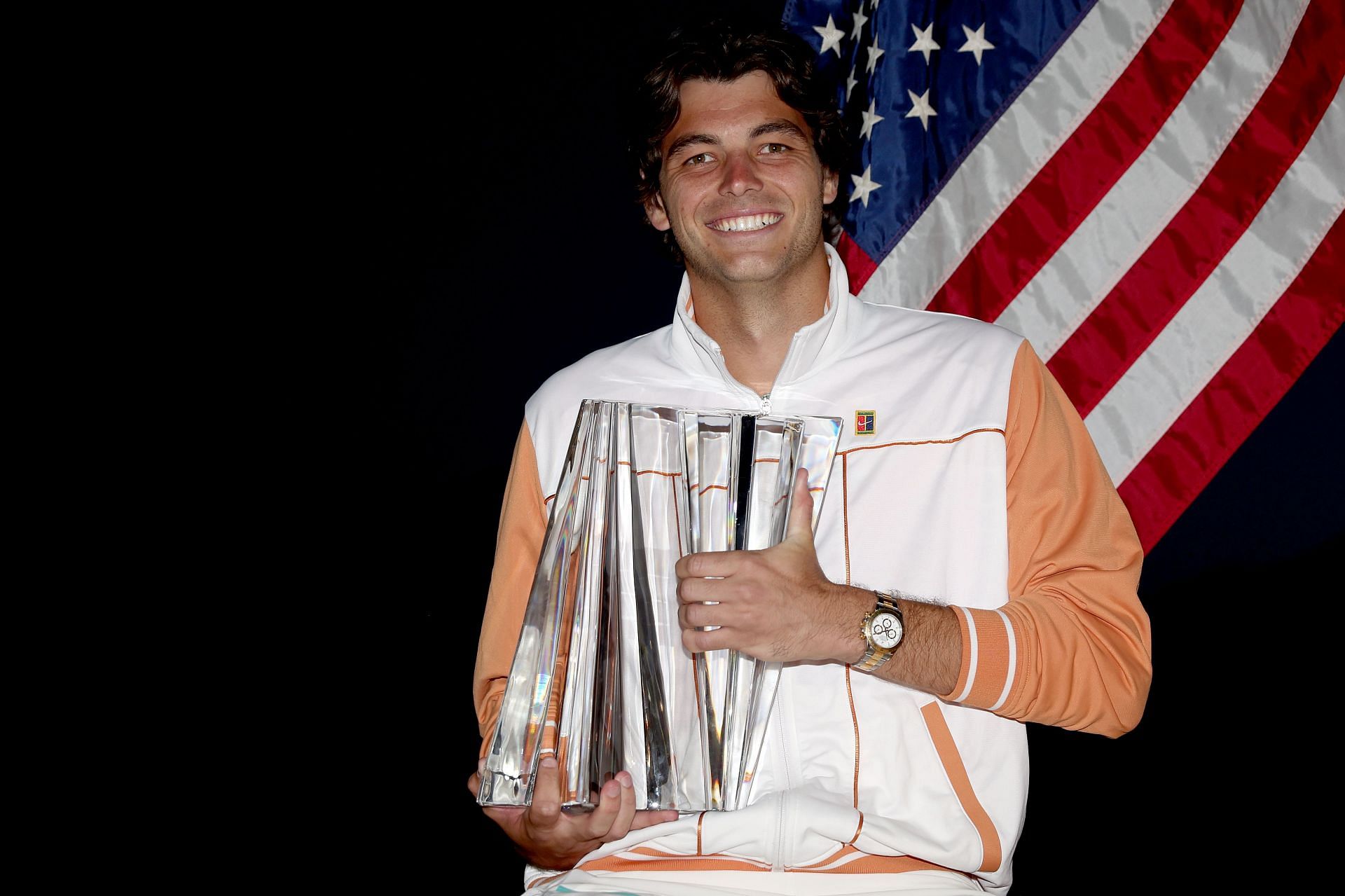 Taylor Fritz poses with his BNP Paribas Open title at Indian Wells