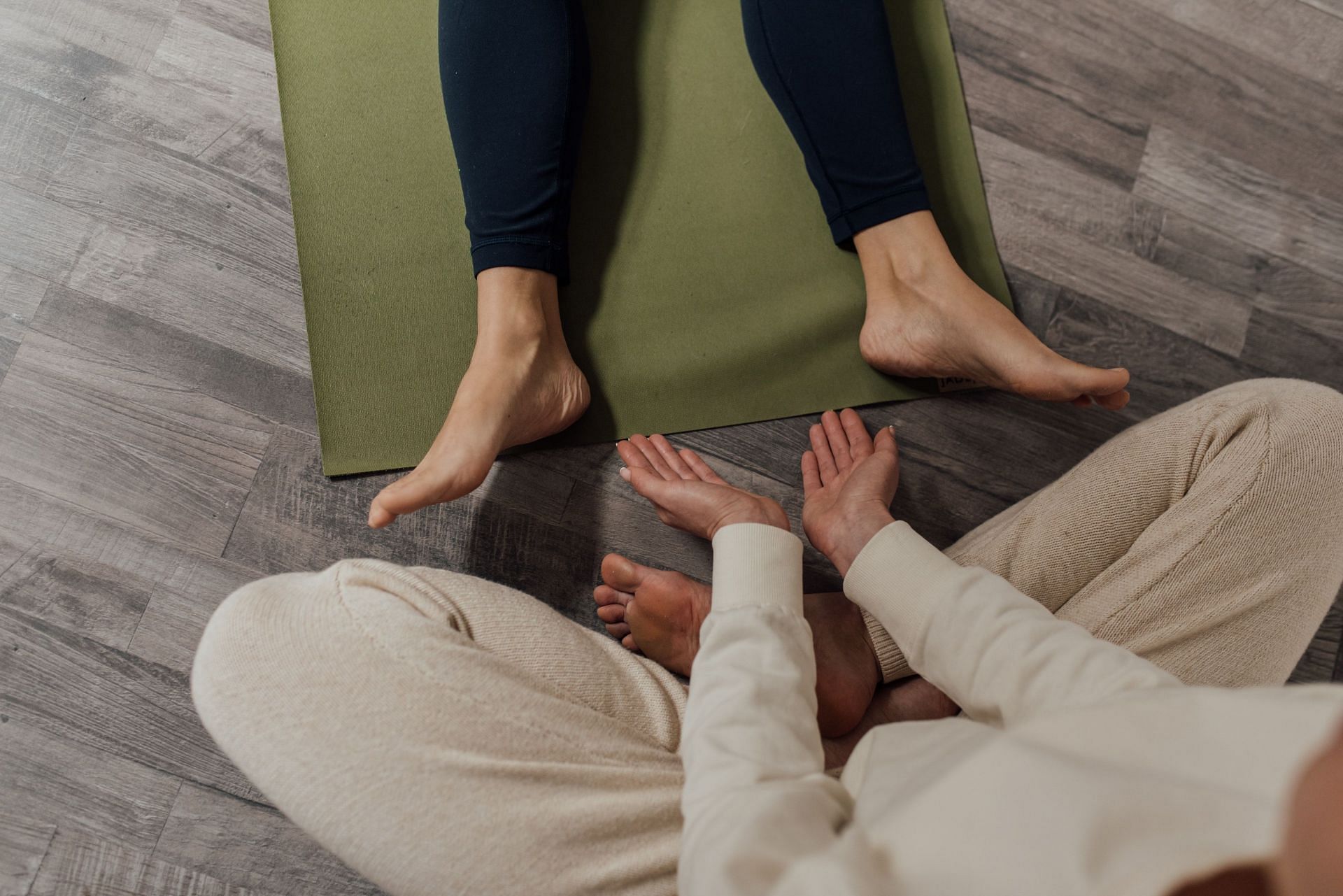The fundamental tenet of reiki therapy is that someone who has little energy is more likely to be ill or worried. (Image via Pexels/ Arina Krasnikova)