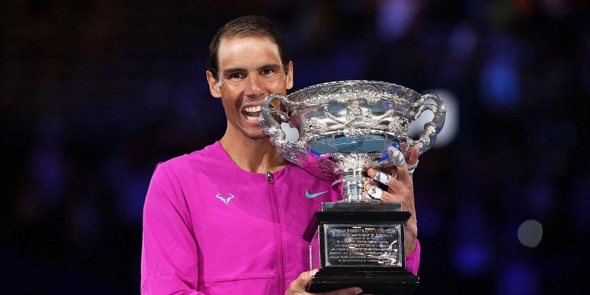 Rafael Nadal celebrates with Norman Brooks Challenge Cup after winning the 2022 Australian Open.