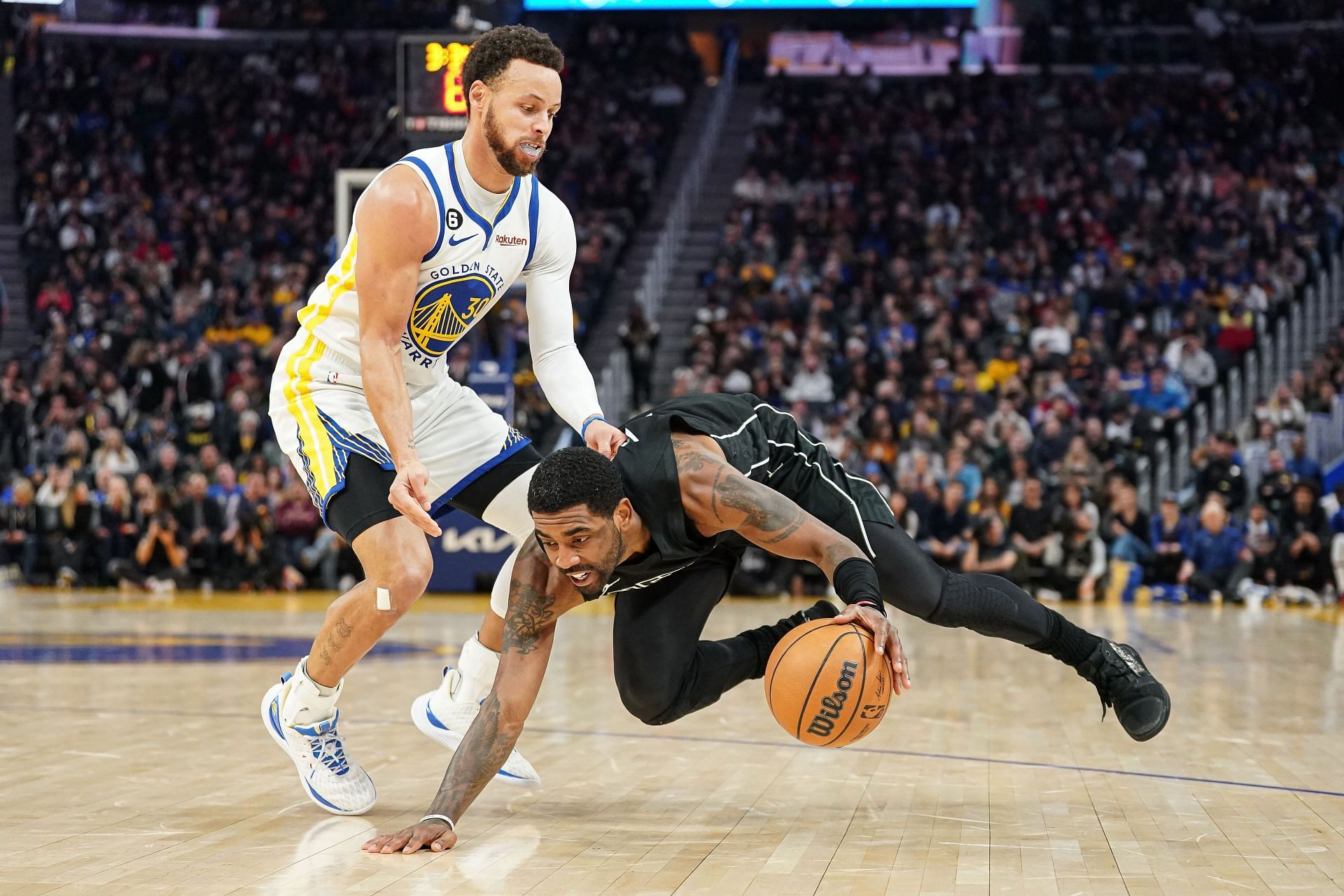 Kyrie Irving of the Brooklyn Nets against Steph Curry of the Golden State Warriors