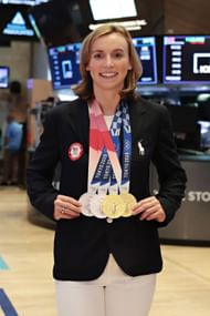 Katie Ledecky poses for a photo at the New York Stock Exchange (Photo by Cindy Ord/Getty Images)