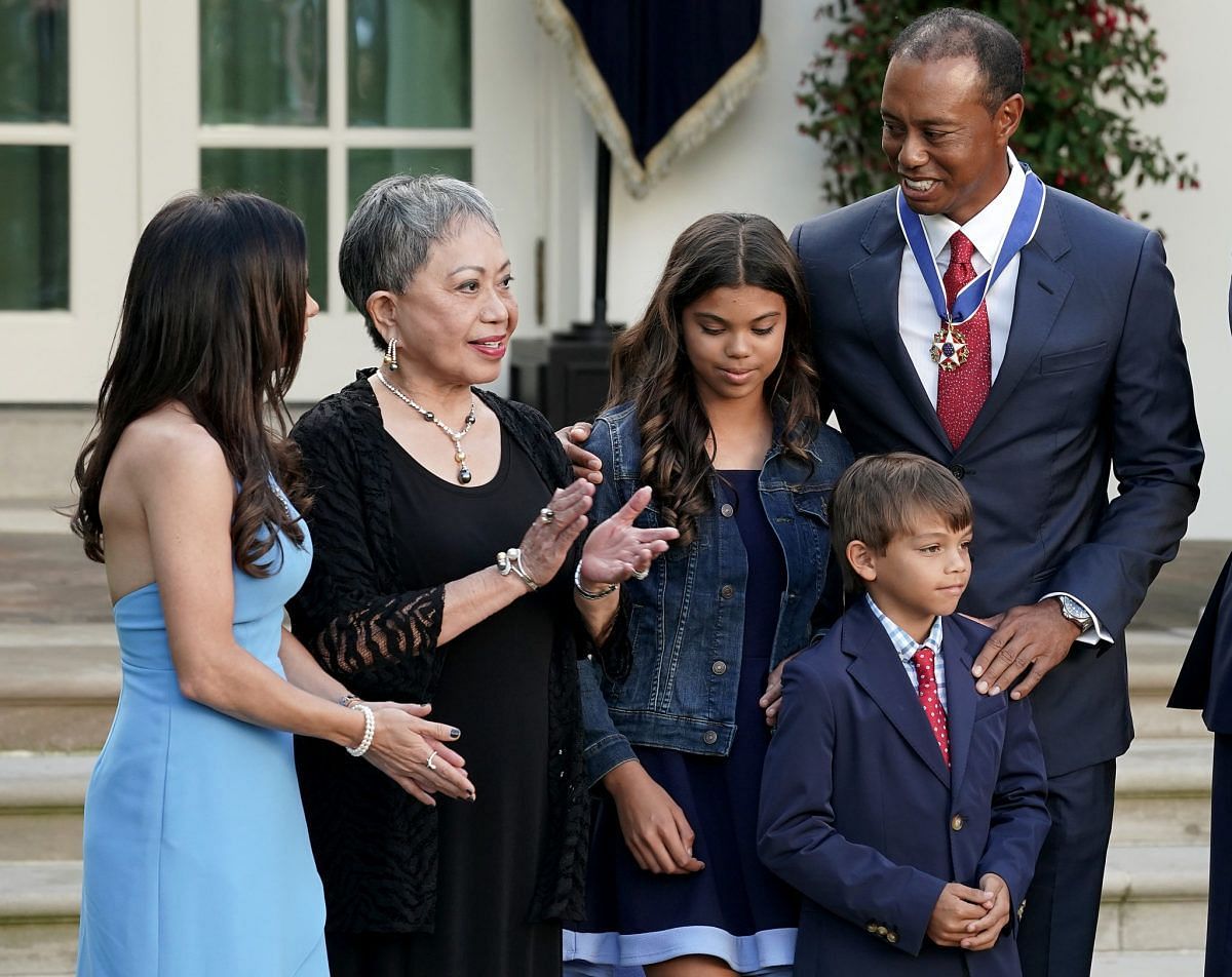 Tiger Woods with children Sam and Charlie (Image via Chip Somodevilla/Getty Images)