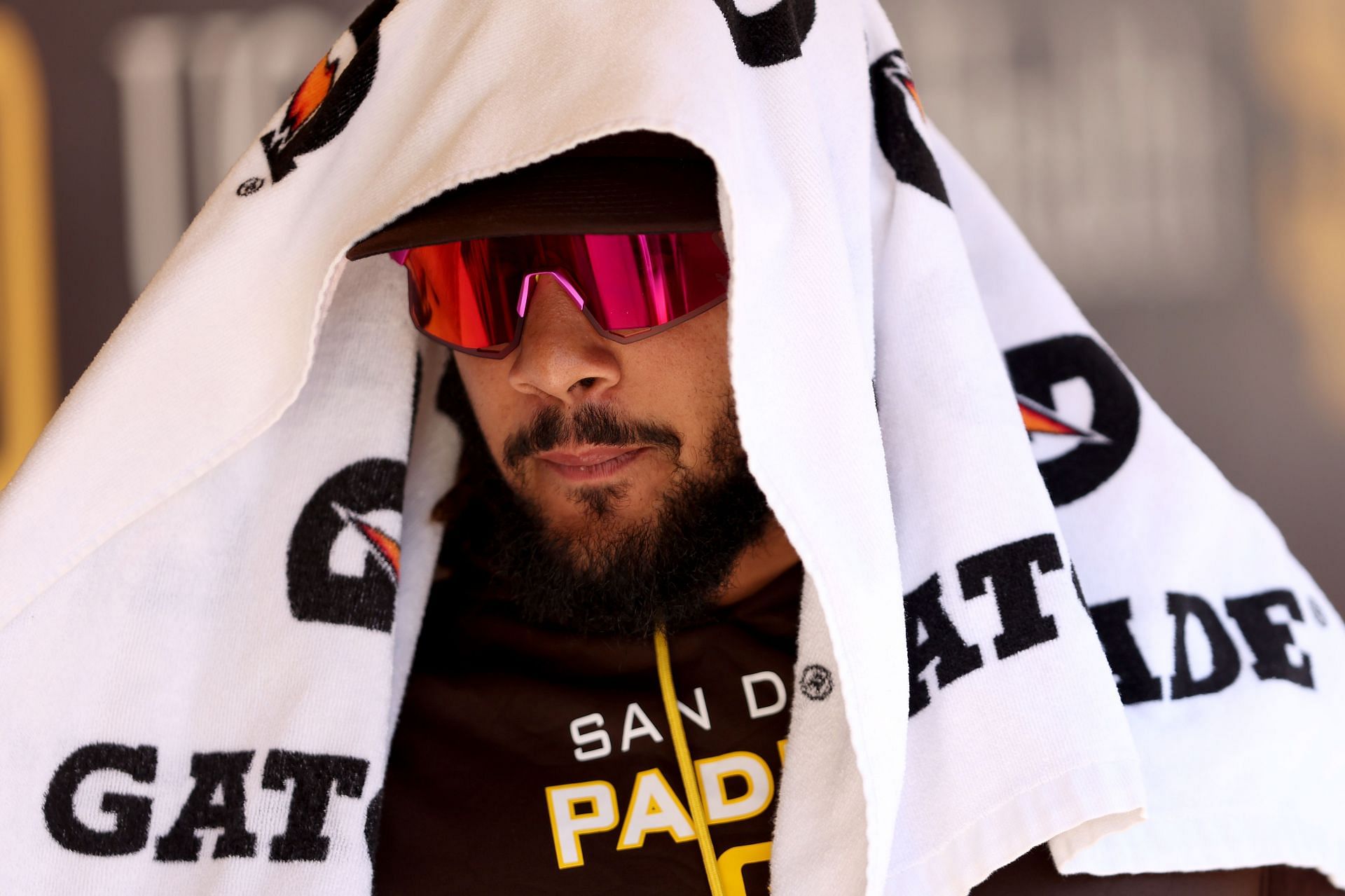 Fernando Tatis Jr. of the San Diego Padres looks on from the dugout.