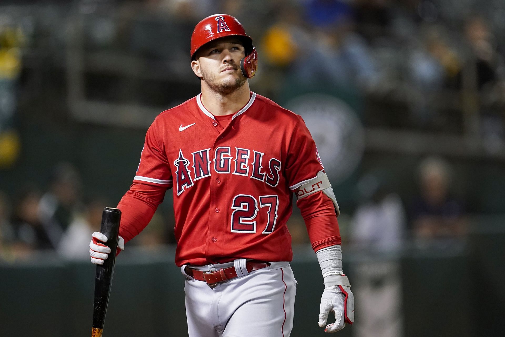 Mike Trout walks back to dug out after a pop fly against the Oakland Athletics