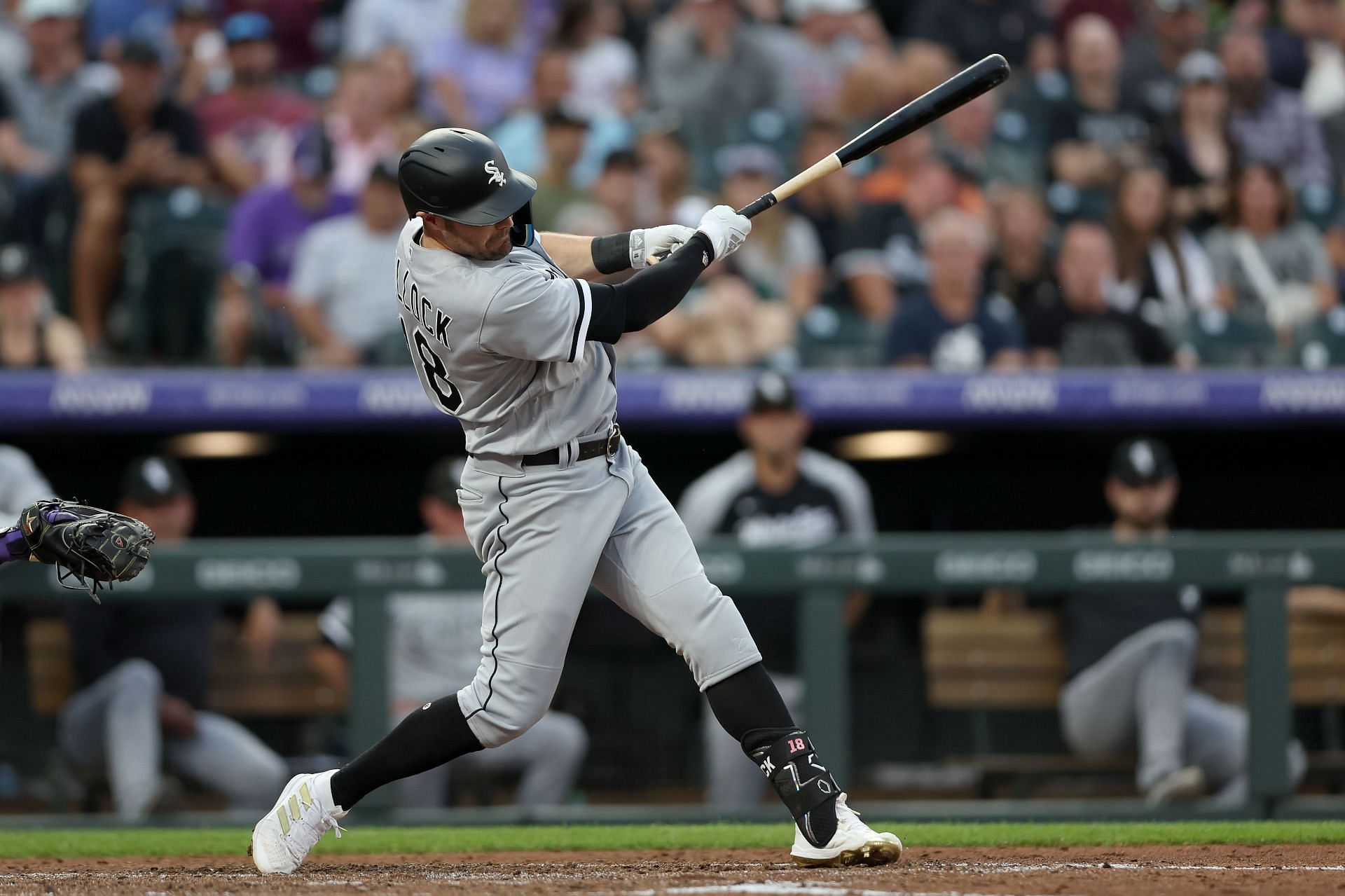 AJ Pollock hits a RBI single against the Colorado Rockies in the fourth inning at Coors Field