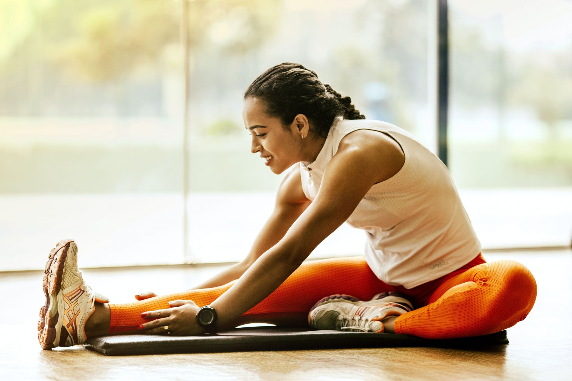 Simple seated stretch (Image via Pexels/Jonathan Borba)