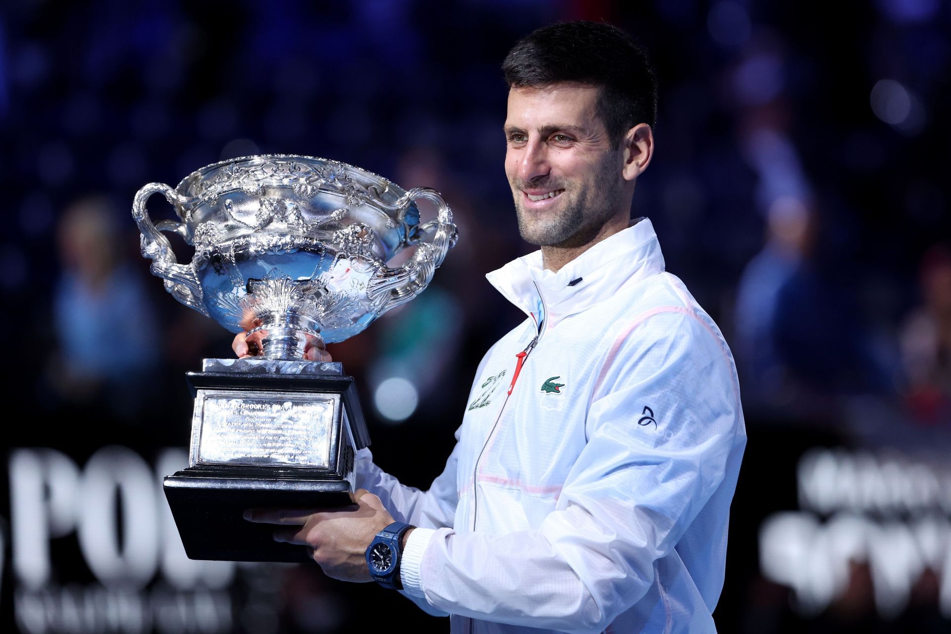 Novak Djokovic with the 2023 Australian Open trophy