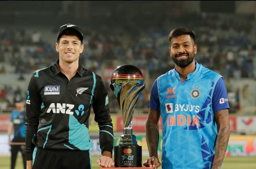 Mitchell Santner and Hardik Pandya posing with the T20I Trophy [Pic Credit: BCCI]