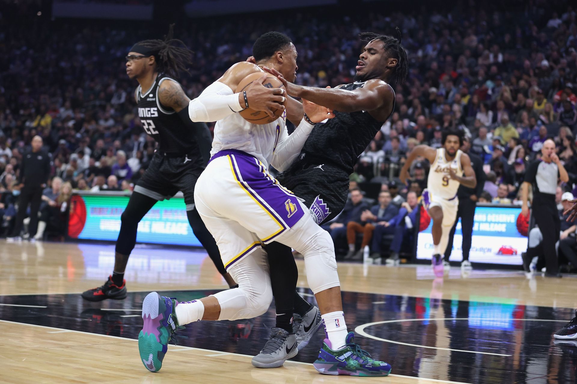 Russell Westbrook gets fouled by Davion Mitchell