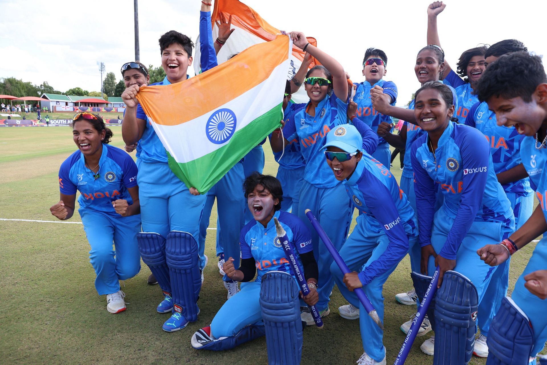 Indian players celebrate a historic victory. 