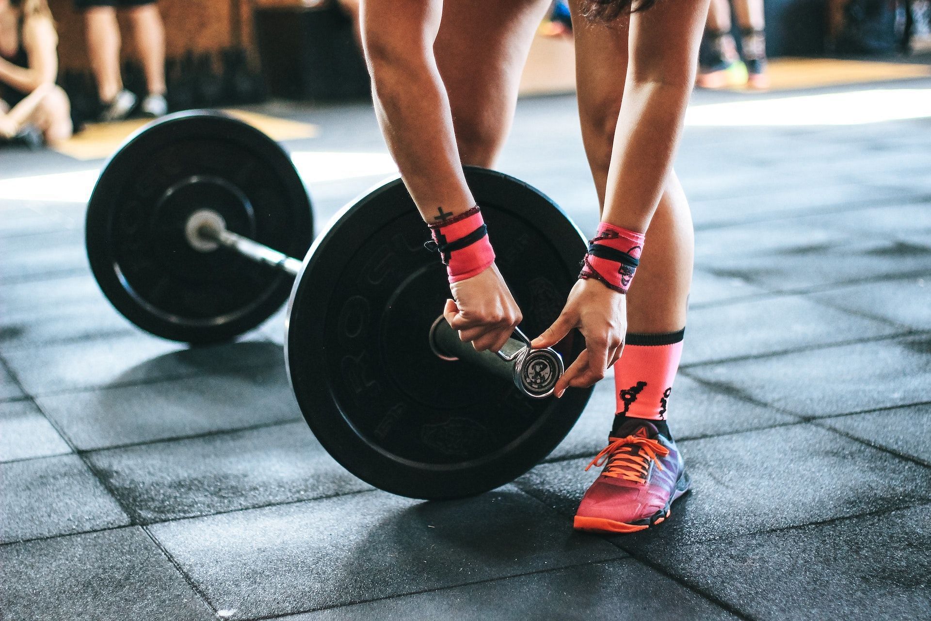The barbell straight legged deadlift is a challenging variation. (Photo via Pexels/Victor Freitas)