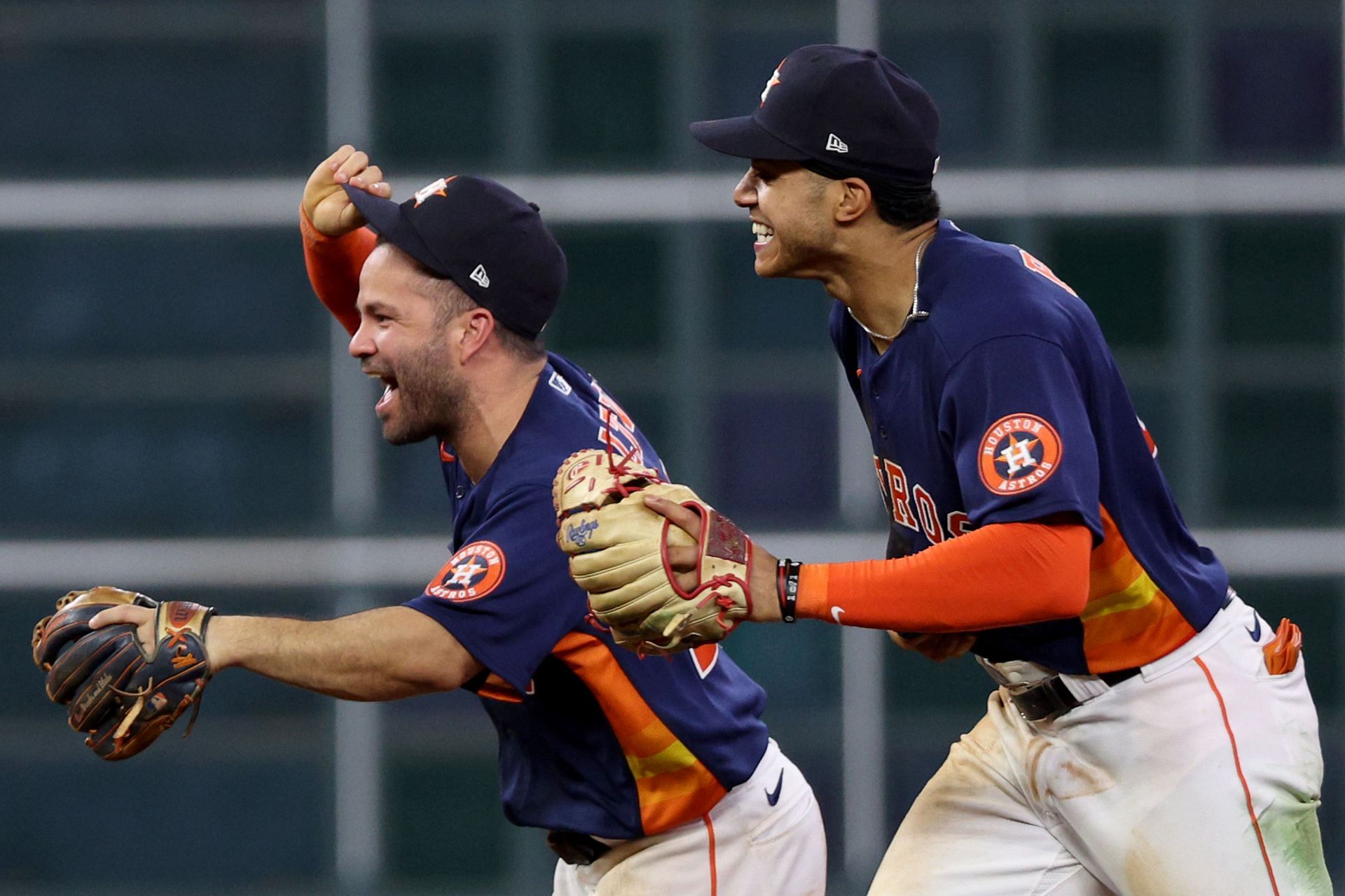HOUSTON, TEXAS - NOVEMBER 05: Jose Altuve #27 and Jeremy Pena #3 of the Houston Astros celebrate after defeating the Philadelphia Phillies 4-1 to win the 2022 World Series in Game Six of the 2022 World Series at Minute Maid Park on November 05, 2022 in Houston, Texas. (Photo by Harry How/Getty Images)