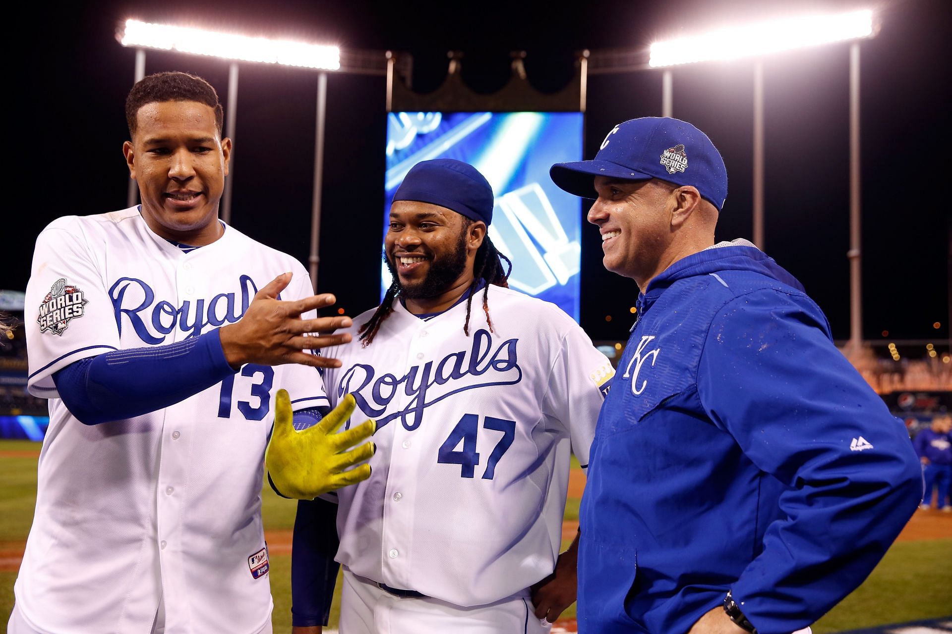 Salvador Perez (13), Johnny Cueto (47) and Pedro Grifol of the Kansas City Royals all smiles during the 2015 World Series