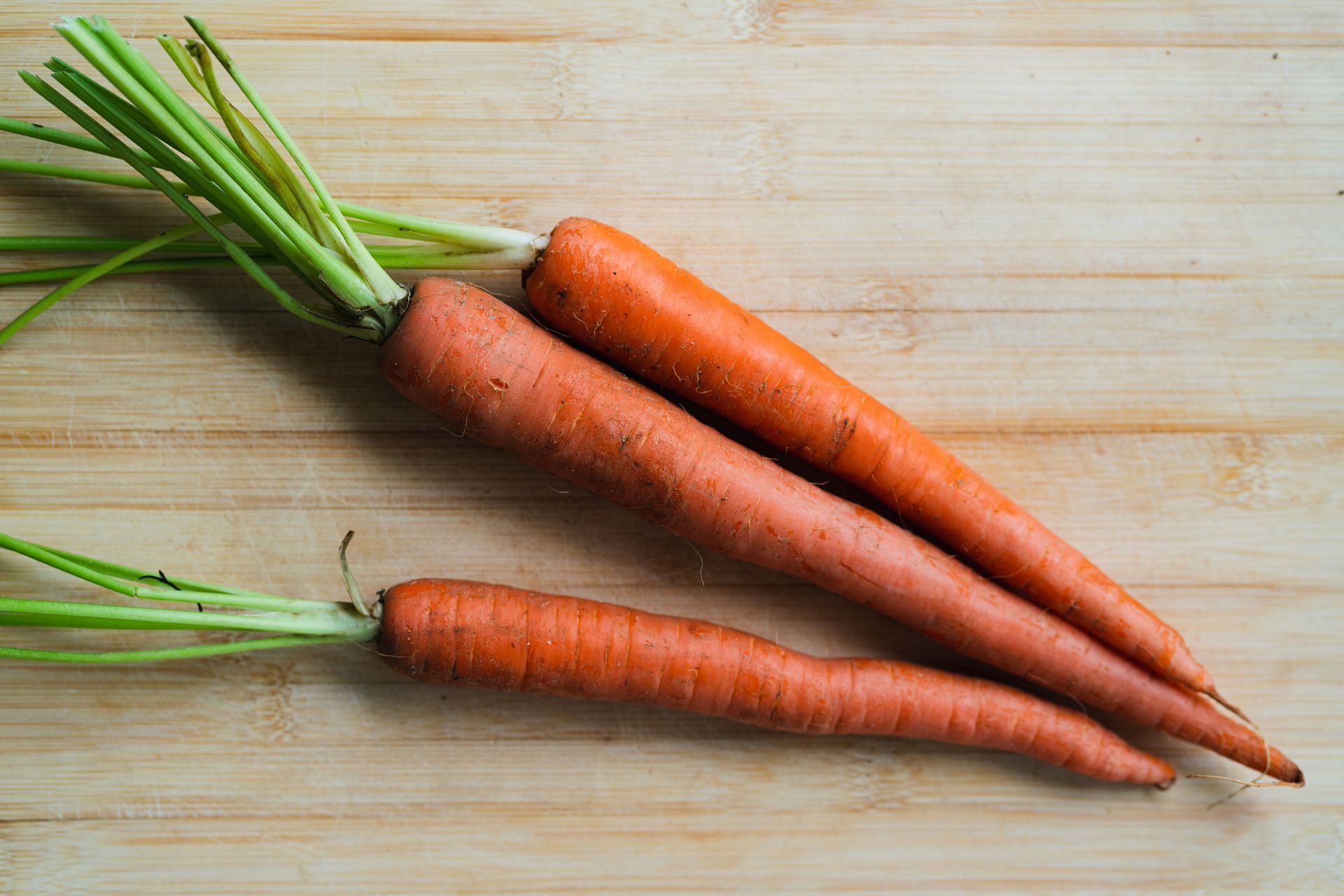 Carrots are also high in vitamin A, which helps boost your immune system. (Image via Unsplash / Armando Arauz)