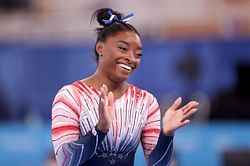 How many gymnastics records does Simone Biles hold?