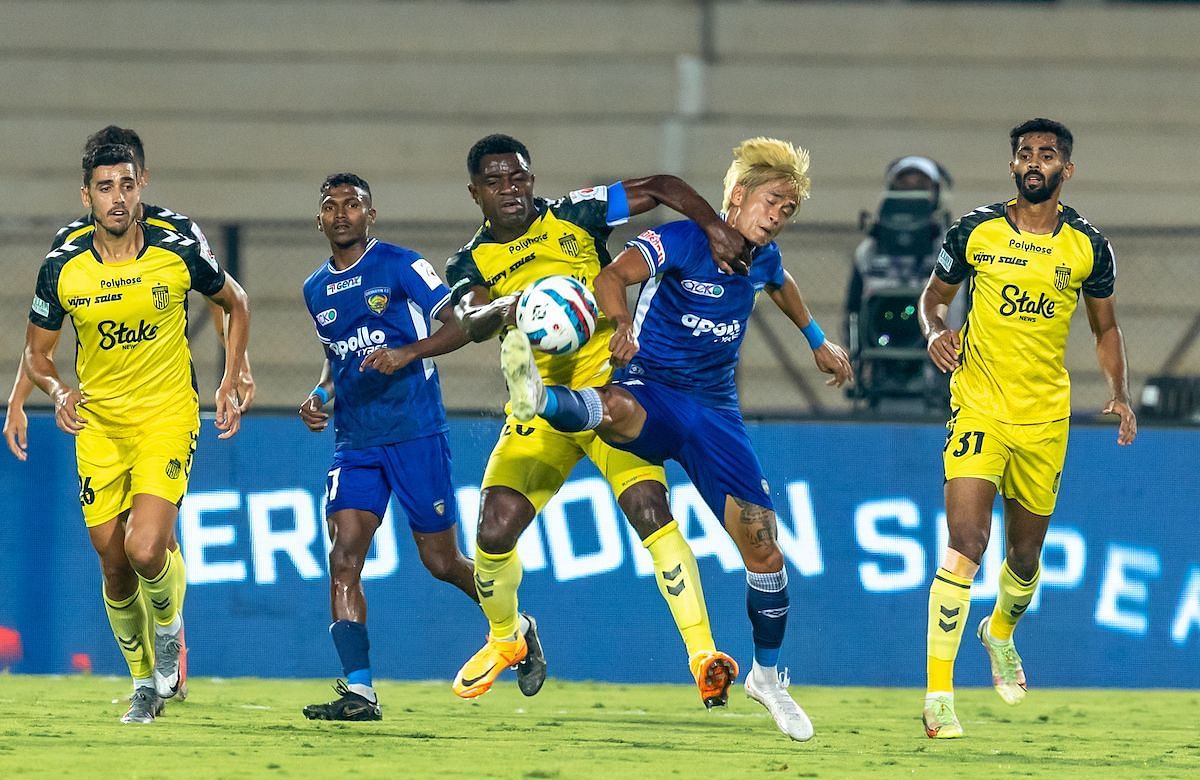 Hyderabad Fc and Chennaiyin FC players in action at the Indian Super League Match.