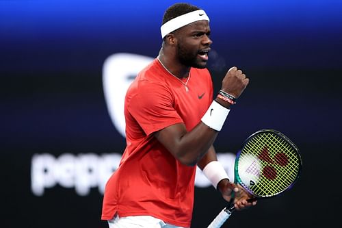 Frances Tiafoe celebrates a point in his semi-final match against Kacper Zuk