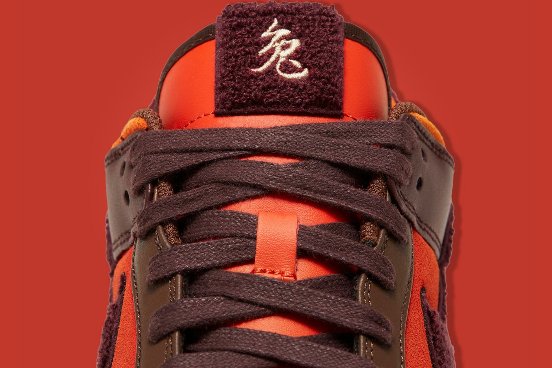 Take a closer look at the Chenille details on the tongues (Image via Nike)