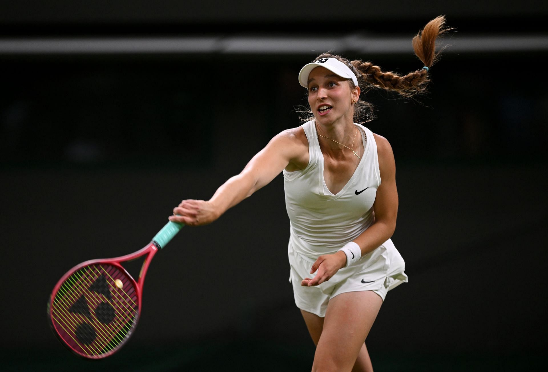 Tamara Korpatsch serves at The Championships Wimbledon 2022