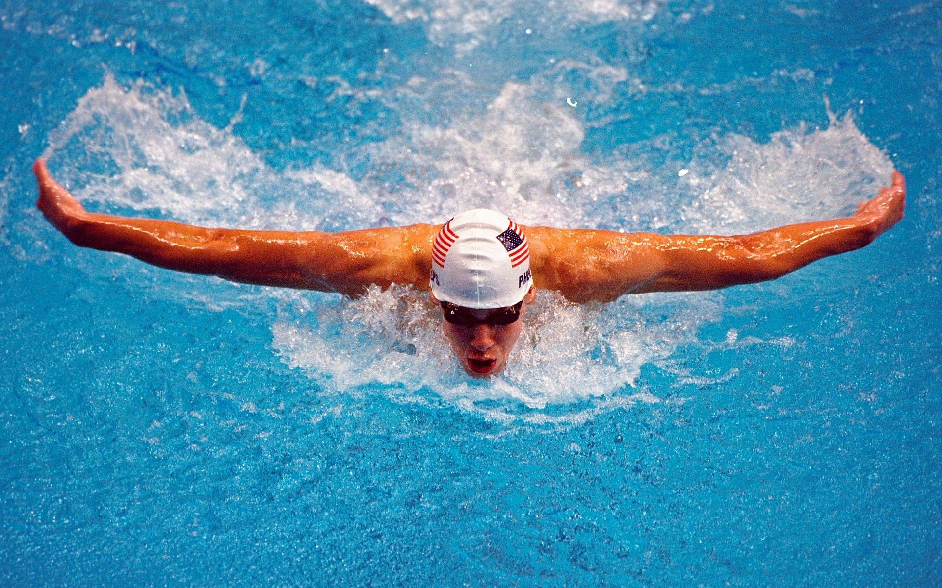 Michael Phelps in action during the Men&#039;s 200m Butterfly during the Sydney 2000 Olympic Games. [Credit: Ross Kinnaird/Allsport]