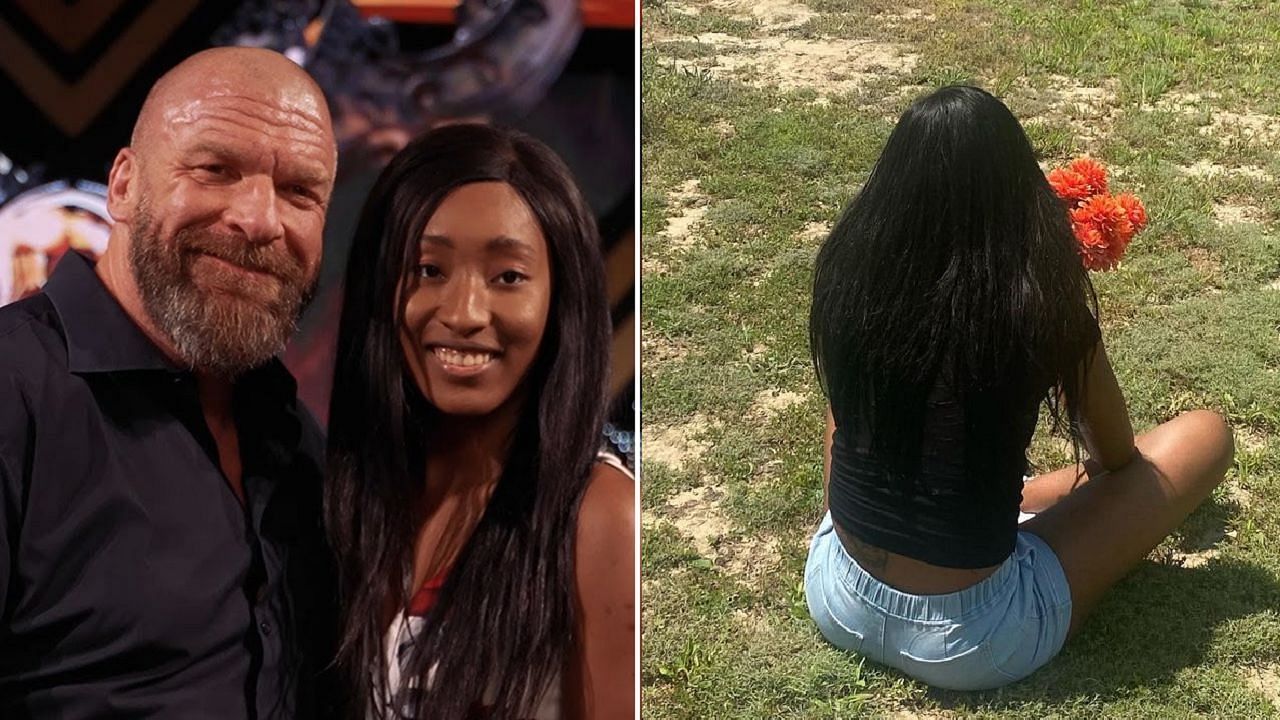Amari Miller poses for a picture with Triple H