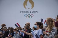 Spectators attend the Olympic Games handover ceremony on August 8, 2021 in Paris, France.