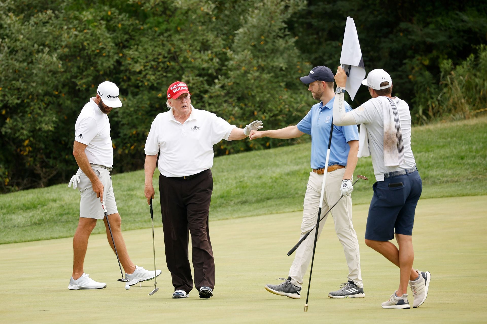 Dustin Johnson and Donald Trump at the LIV Golf Invitational - Bedminster - Pro-Am (Image via Cliff Hawkins/Getty Images)