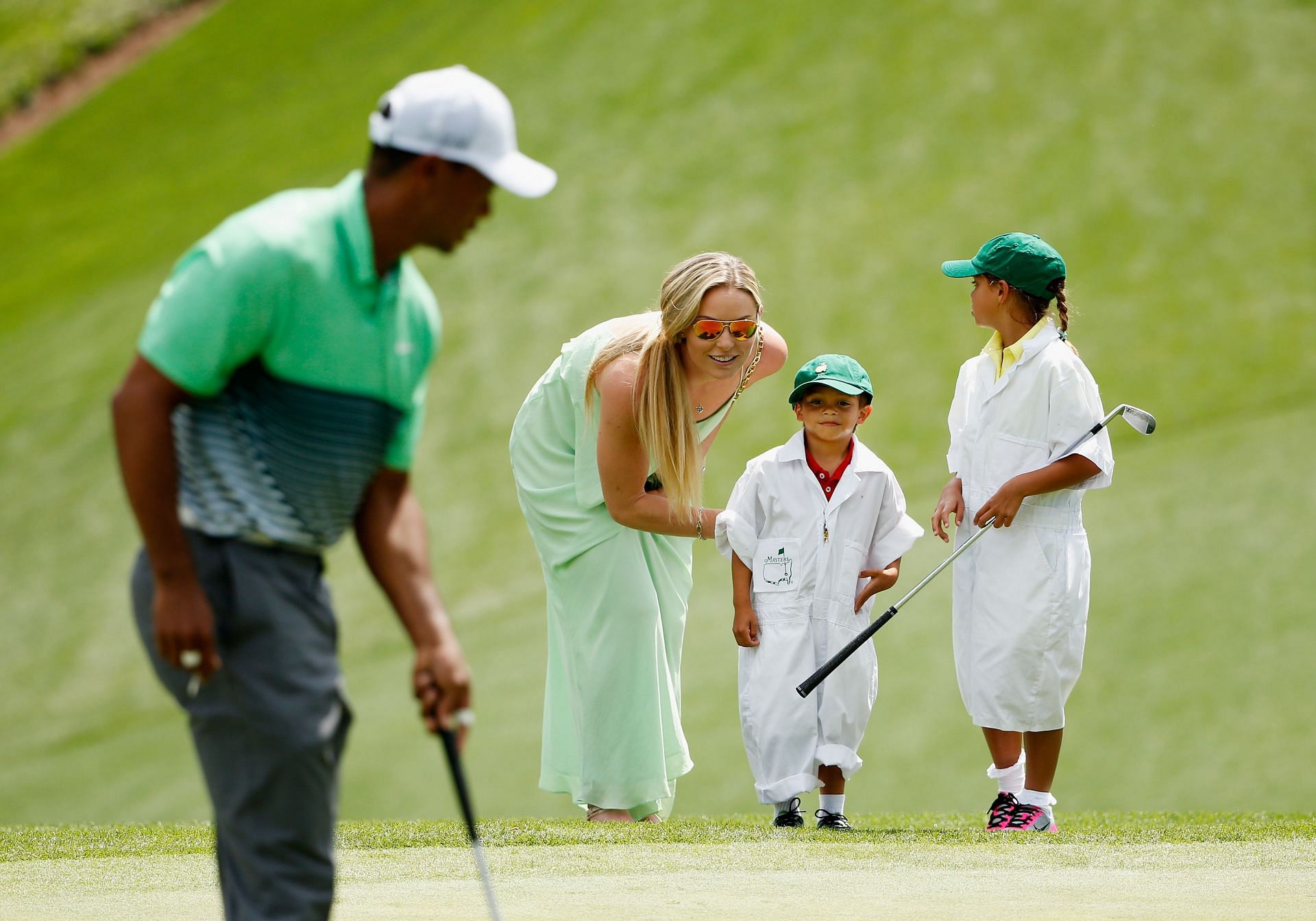 Tiger Woods with Charlie and Sam (Image via Ezra Shaw/Getty Images)