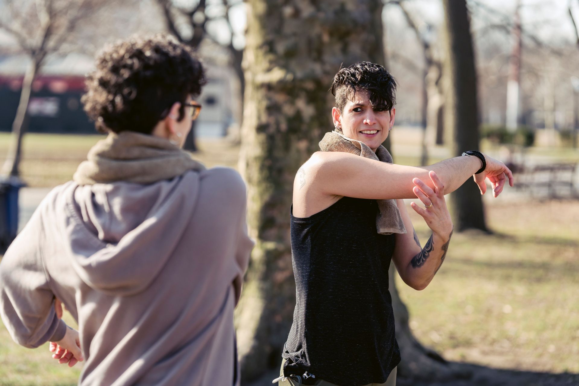 Arm stretching is also important to relax the muscles, (Image via Pexels/Sarah Chai)