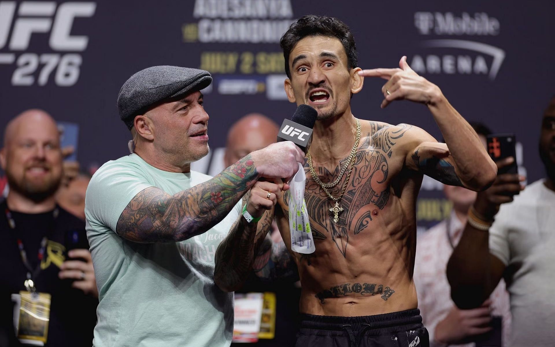 Joe Rogan and Max Holloway at UFC 276 ceremonial weigh-ins