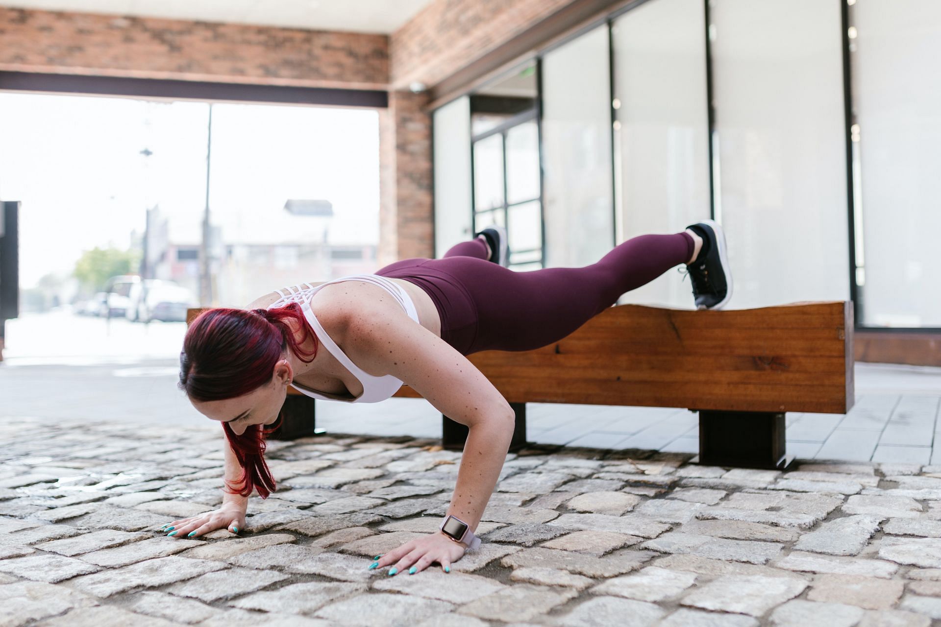 The decline push-up is a more challenging take on the classic push-up! (Image via pexels/Rodnae Productions)