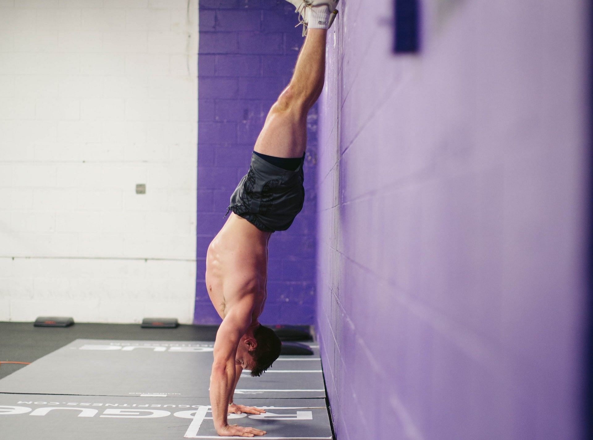 Handstand kick-up (Photo by Mariah Krafft on Unsplash)