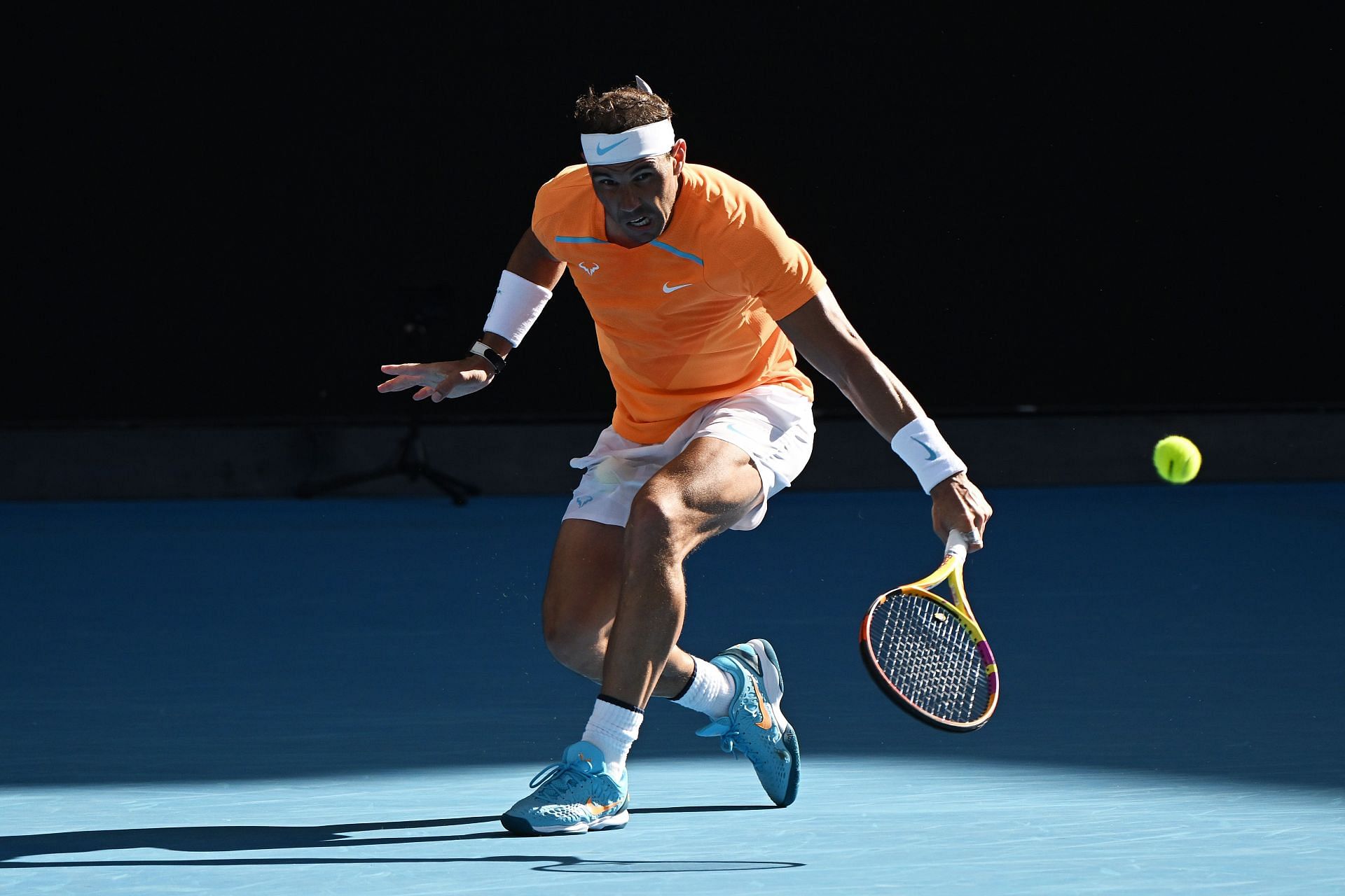 Rafael Nadal plays a backhand in their round one singles match against Jack Draper