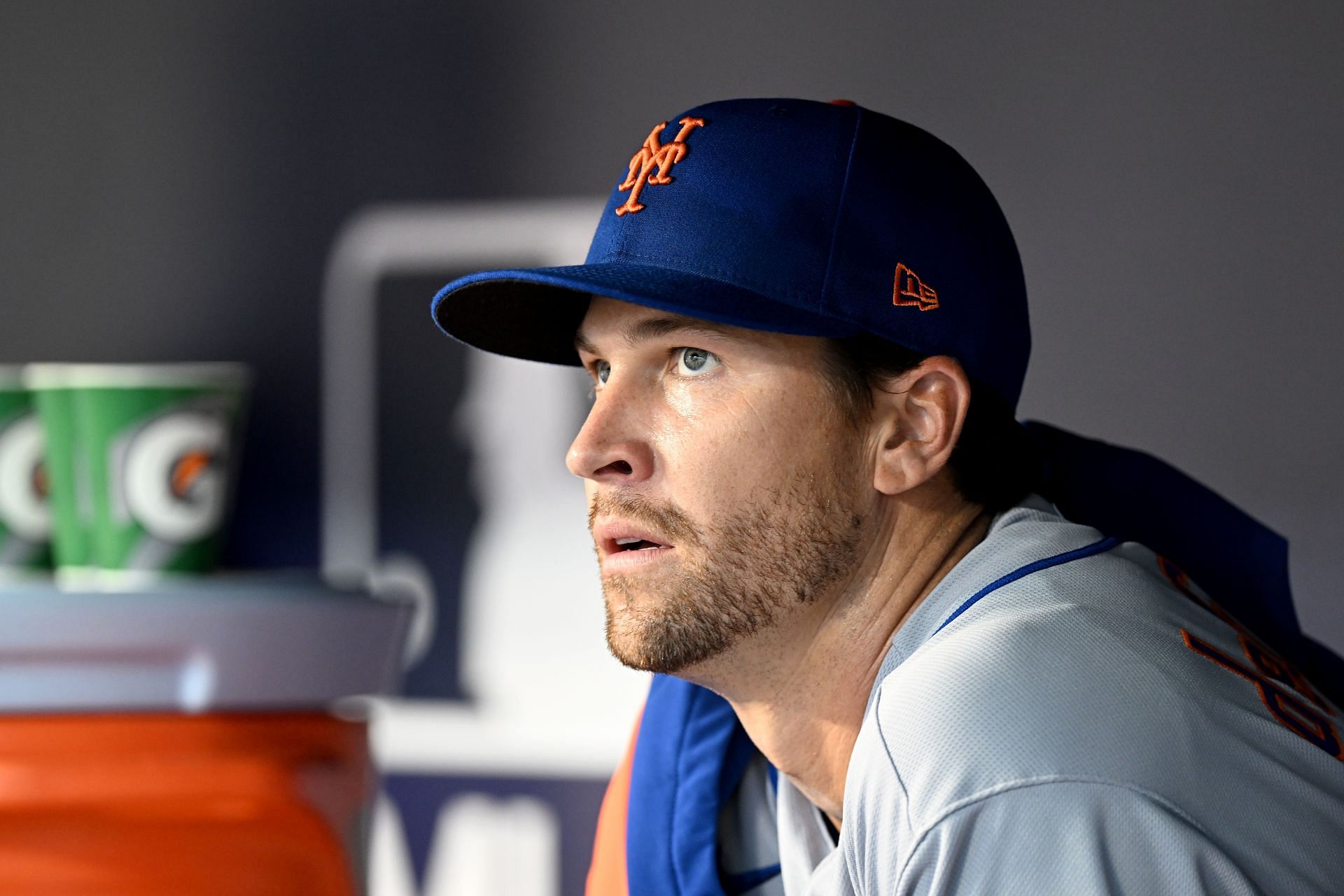Jacob deGrom sits in the dugout against the Washington Nationals at Nationals Park