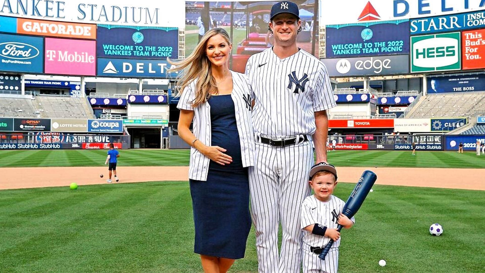 New York Yankees pitcher Gerrit Cole with his wife and son at Yankee Stadium.