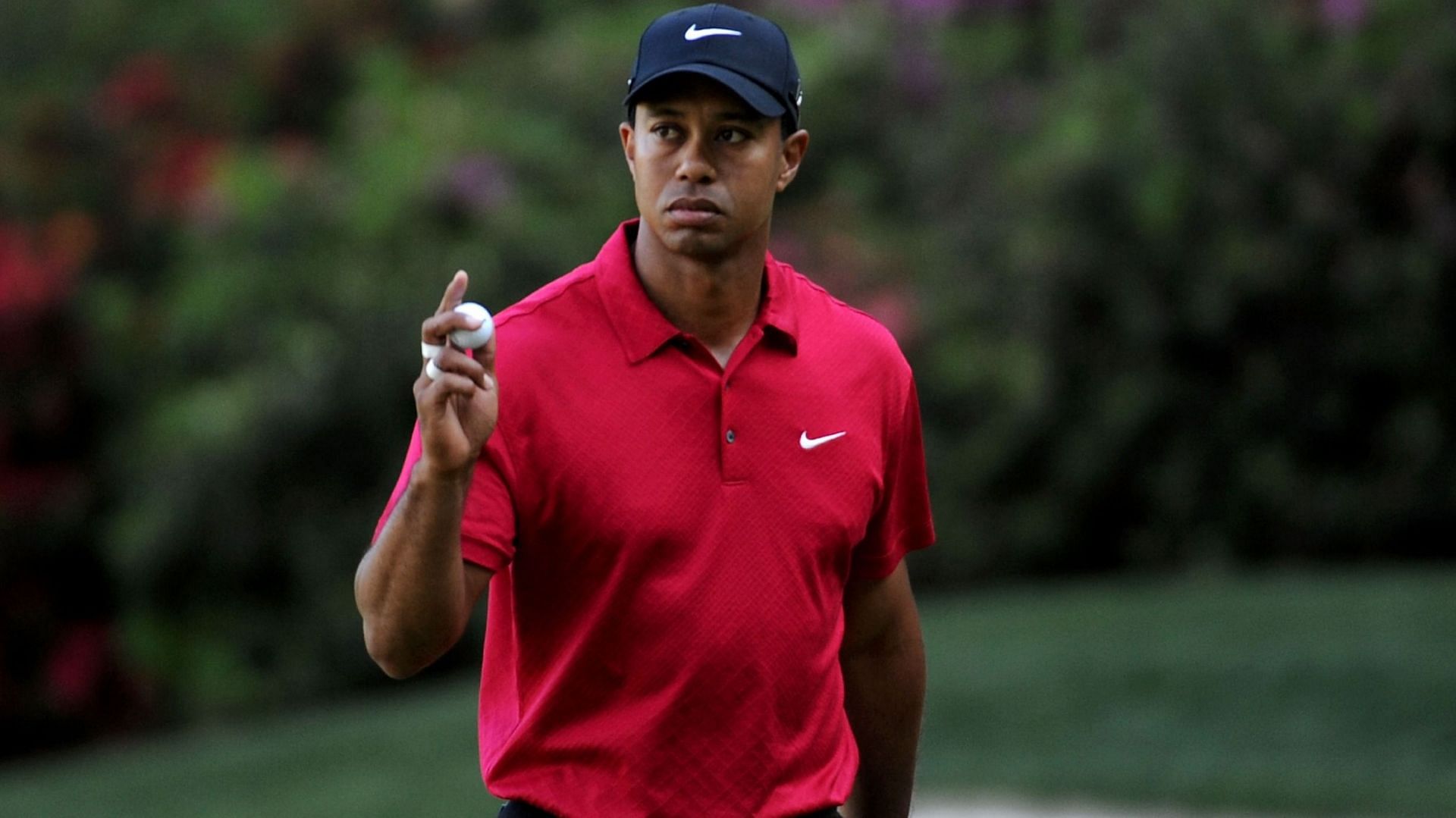 Tiger Woods&#039; trademark red t-shirt was also sold for $139,349