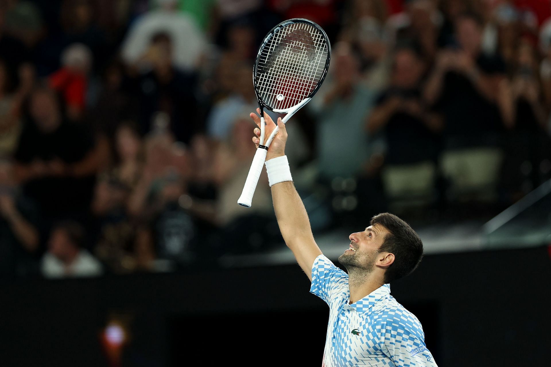 Novak Djokovic celebrates after winning in the Quarterfinal singles match against Andrey Rublev
