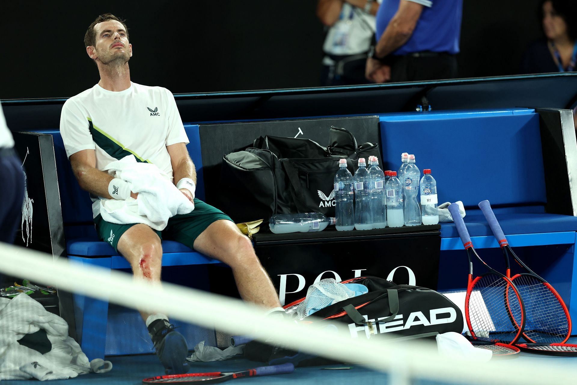 Andy Murray reacts after winning their round one singles match against Matteo Berrettini