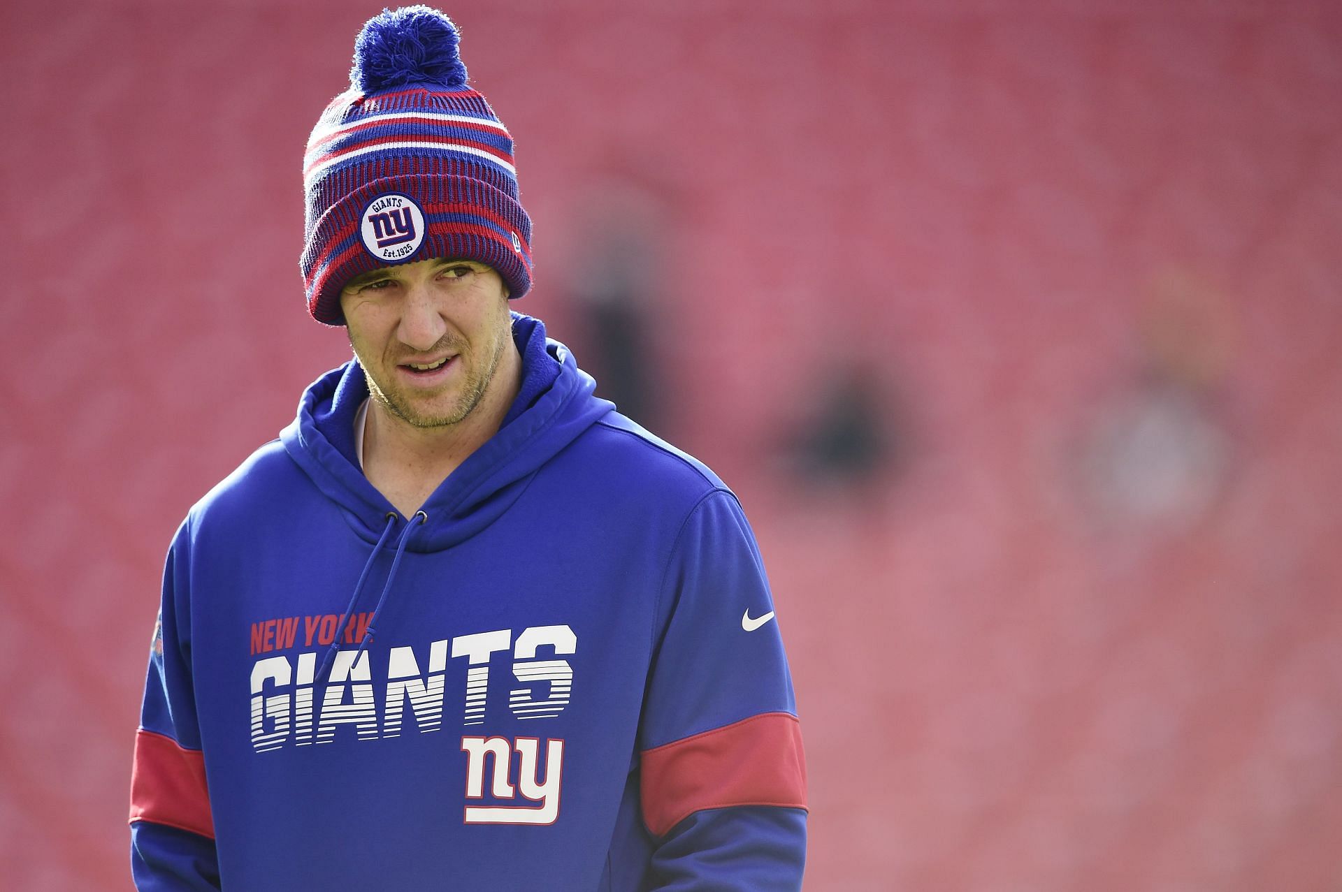 Eli Manning of the New York Giants looks on during warmups before a game against the Washington Redskins
