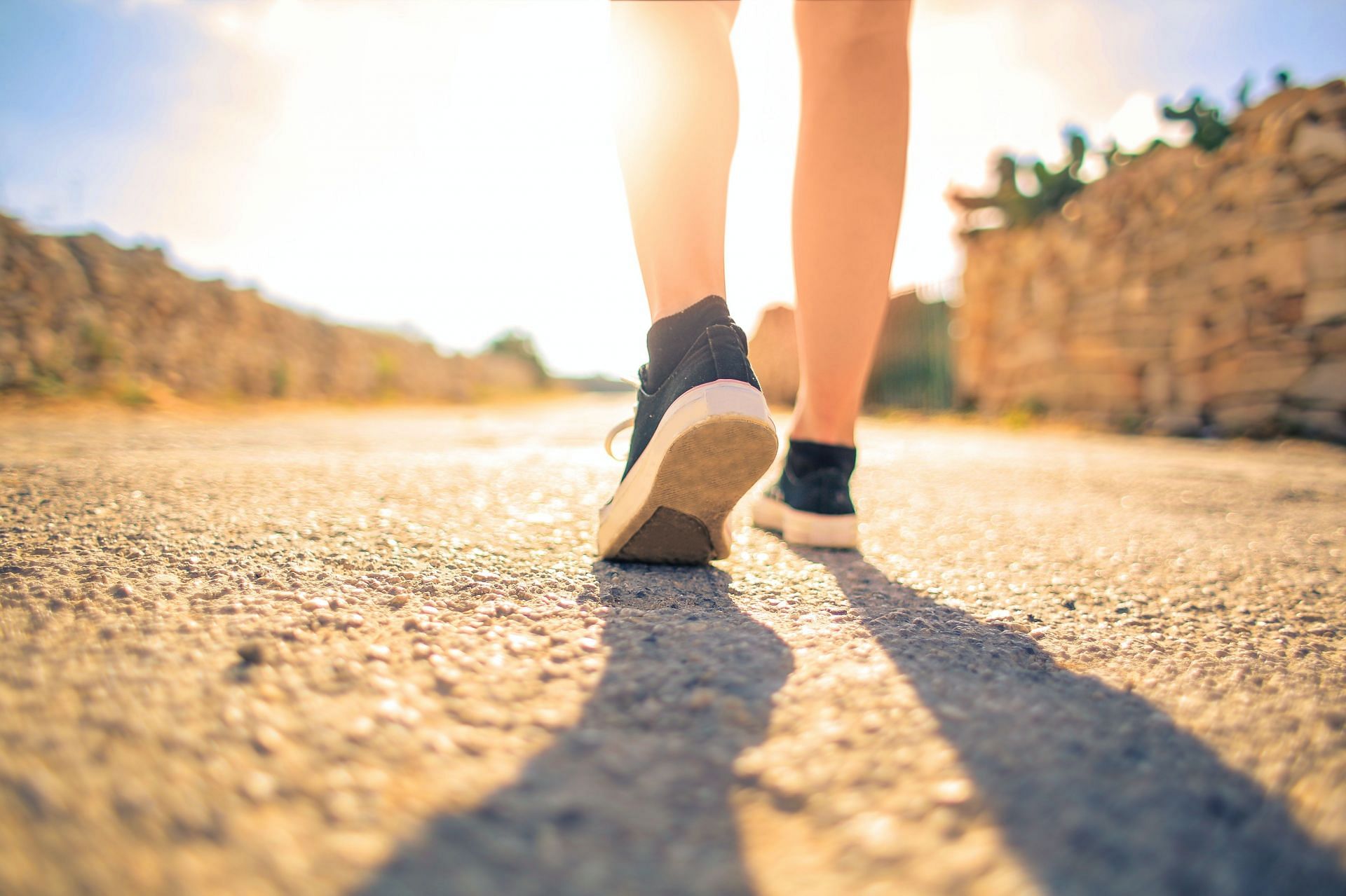 Interval walking is a great way to add intensity to your exercises and burn calories! (Image via pexels/Andrea Piacquadio)
