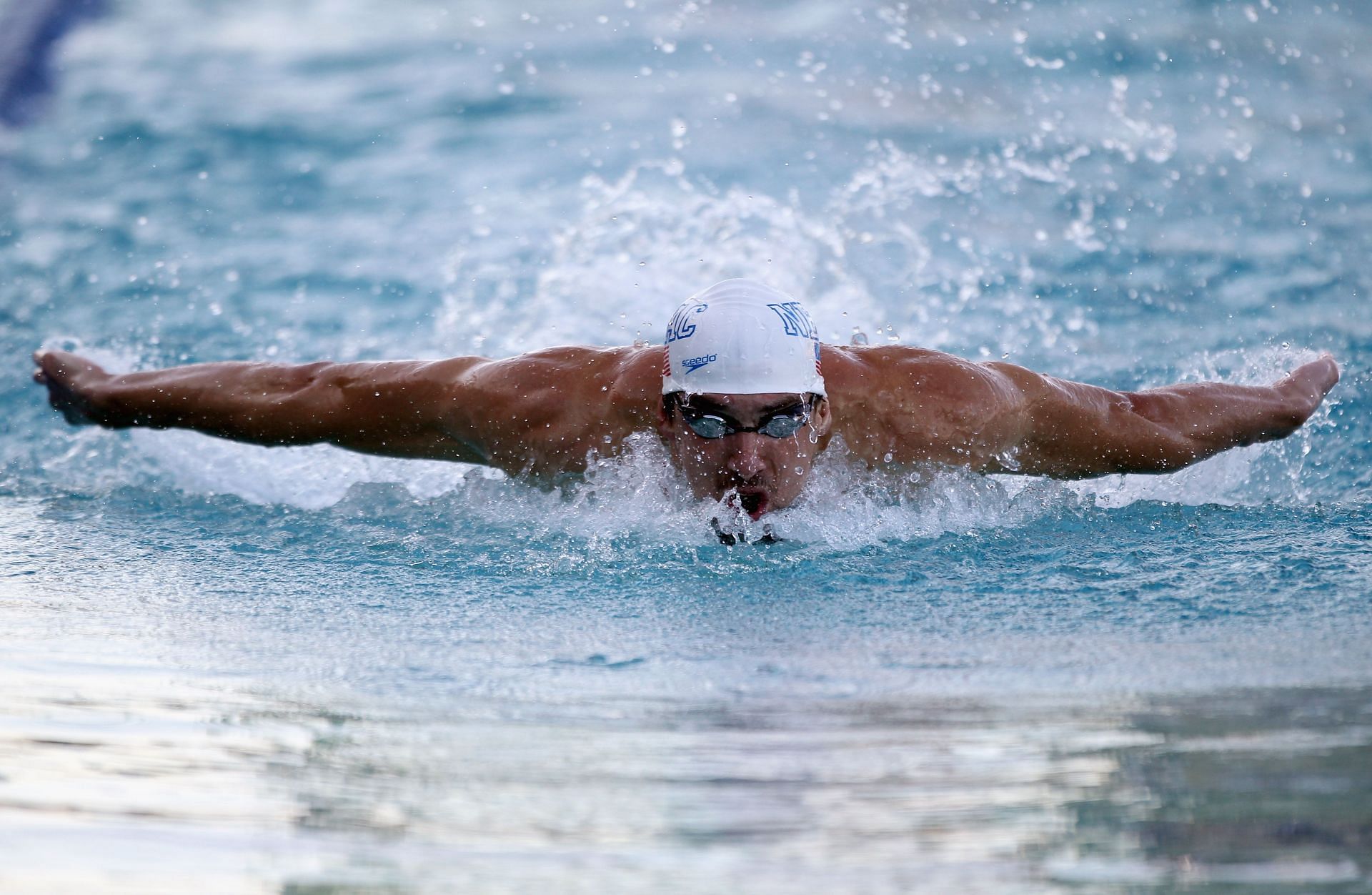 Michael Phelps competes in the mens 100 meter butterfly final during day 2 of the Santa Clara International Grand Prix at George F. Haines International Swim Center on June 17, 2011 in Santa Clara, California. (Photo by Ezra Shaw/Getty Images)