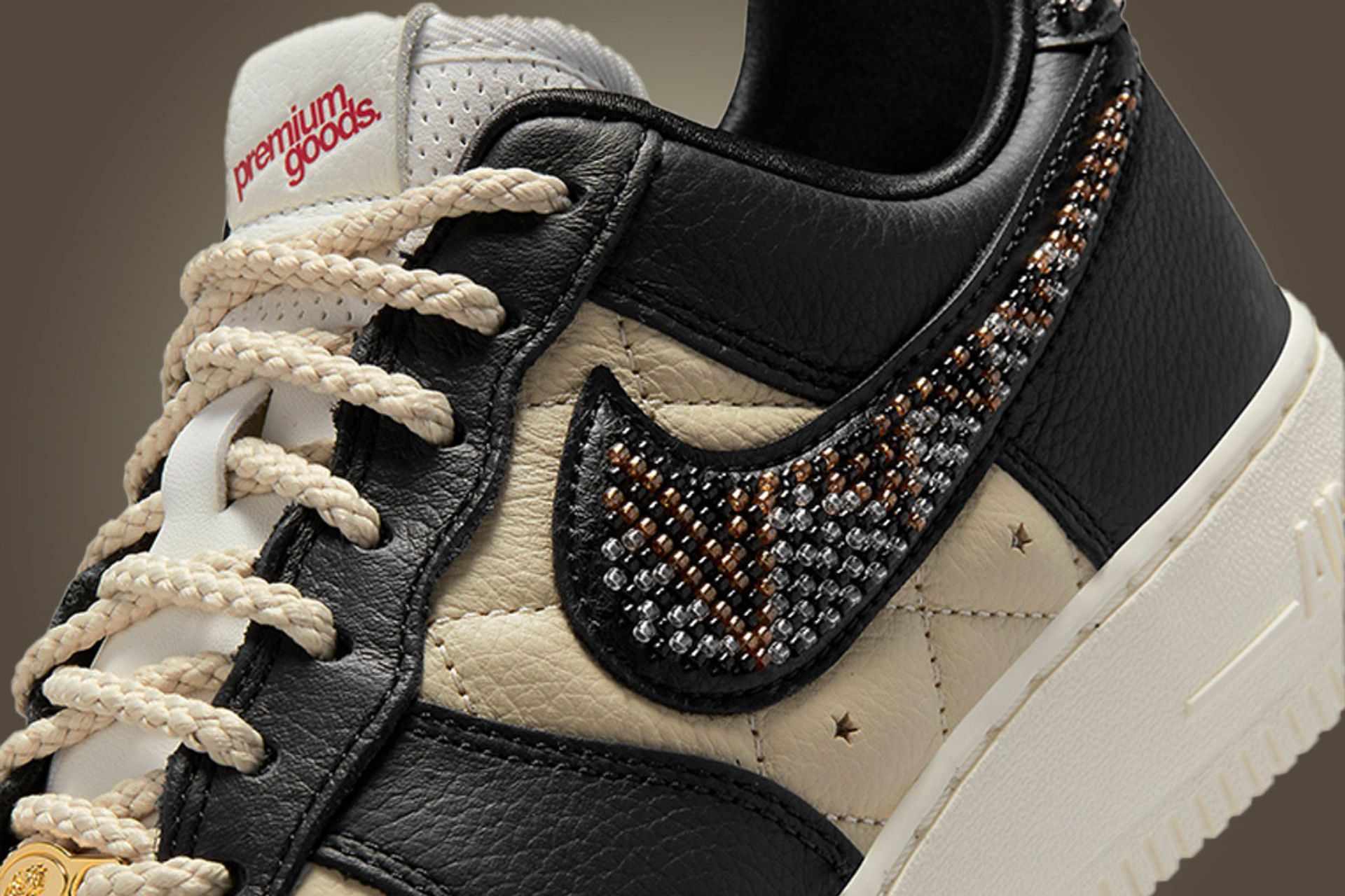 Here&#039;s a detailed view at the beautiful beaded swooshes of the sneakers (Image via Nike)