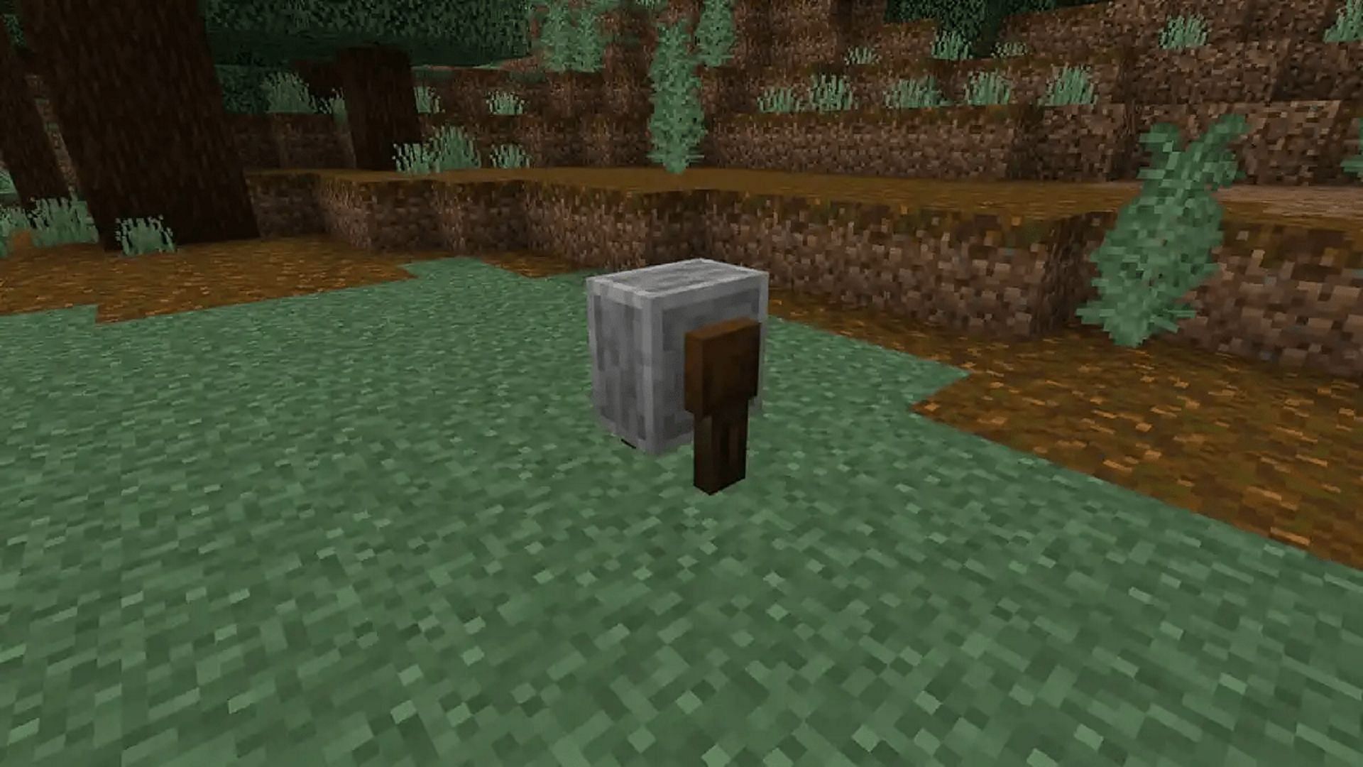 A grindstone can remove players&#039; enchantments and reimburse some of their XP (Image via Mojang)