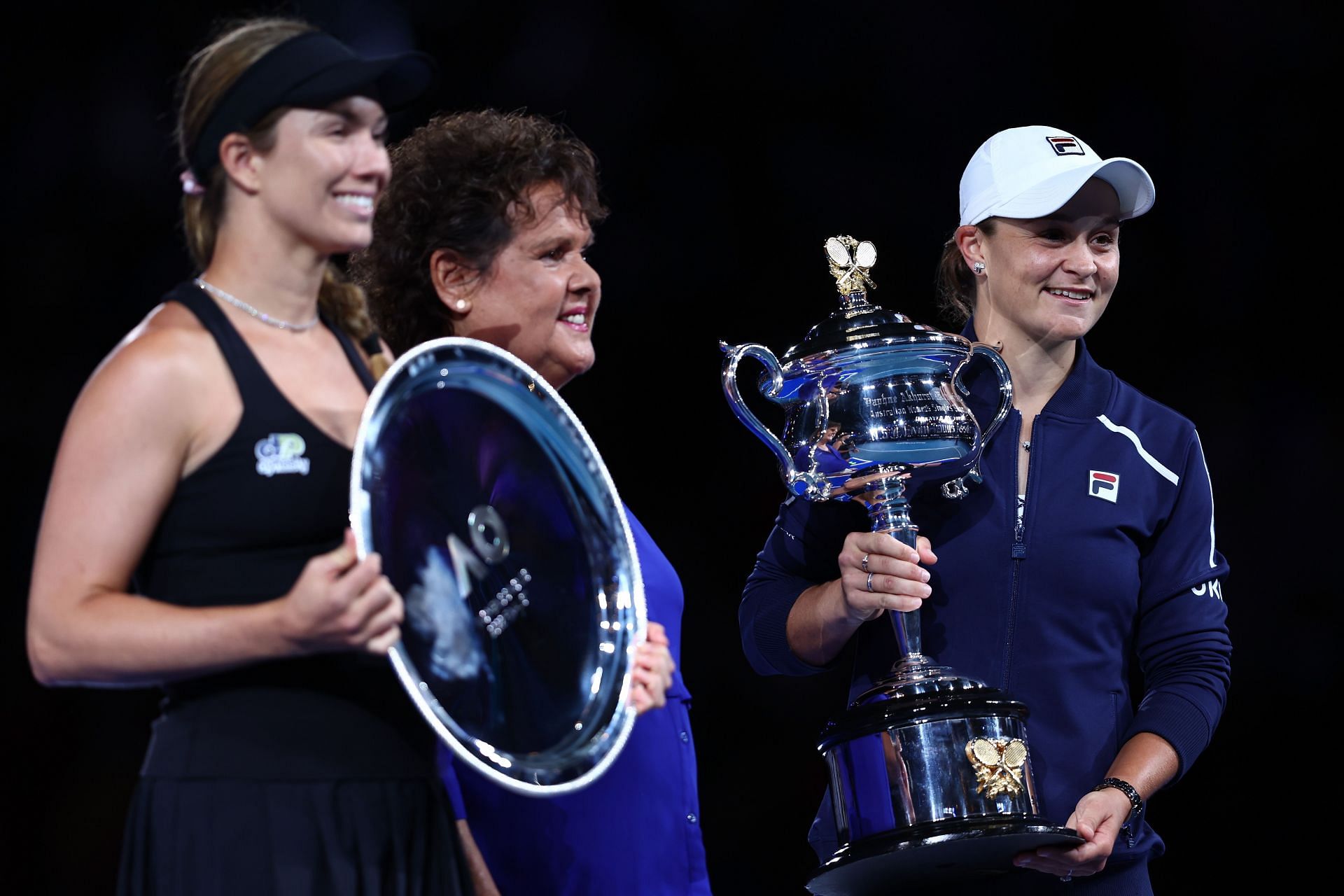 Danielle Collins and Ashleigh Barty at the 2022 trophy presentation ceremony.