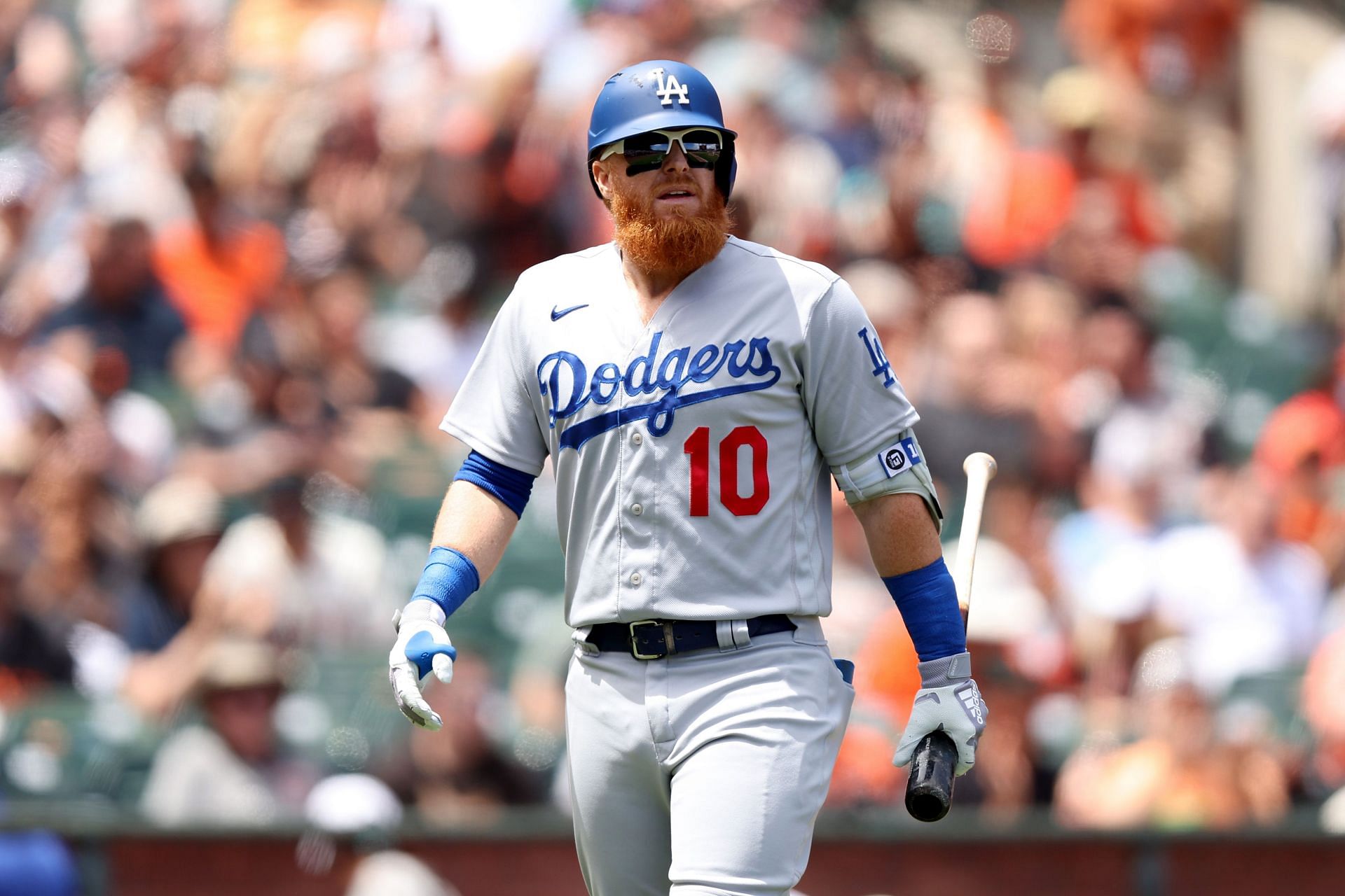 Justin Turner walks back to the dugout after striking out against the San Francisco Giants at Oracle Park.