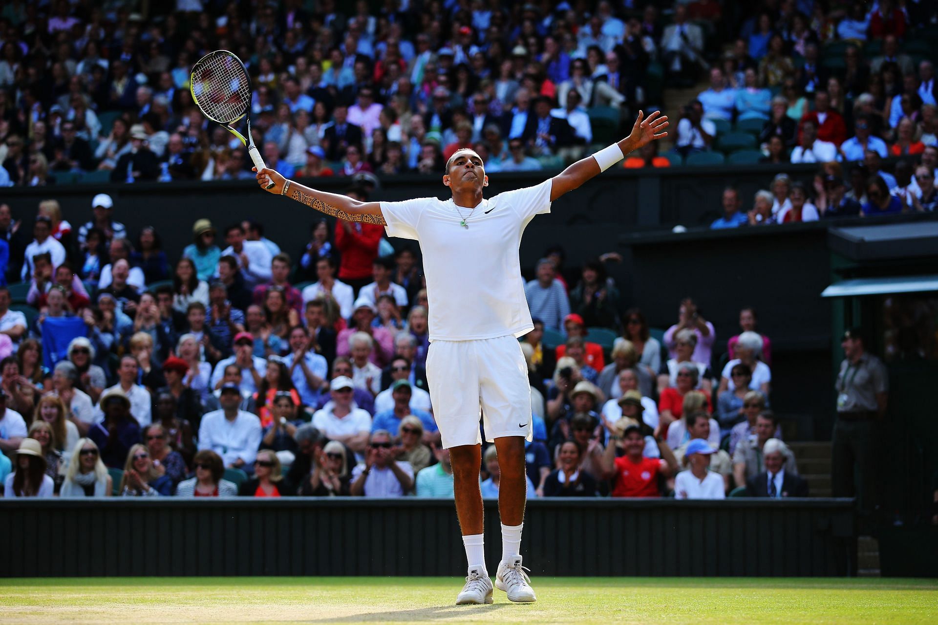 Nick Kyrgios celebrates during his match against Rafael Nadal at Wimbledon 2014.