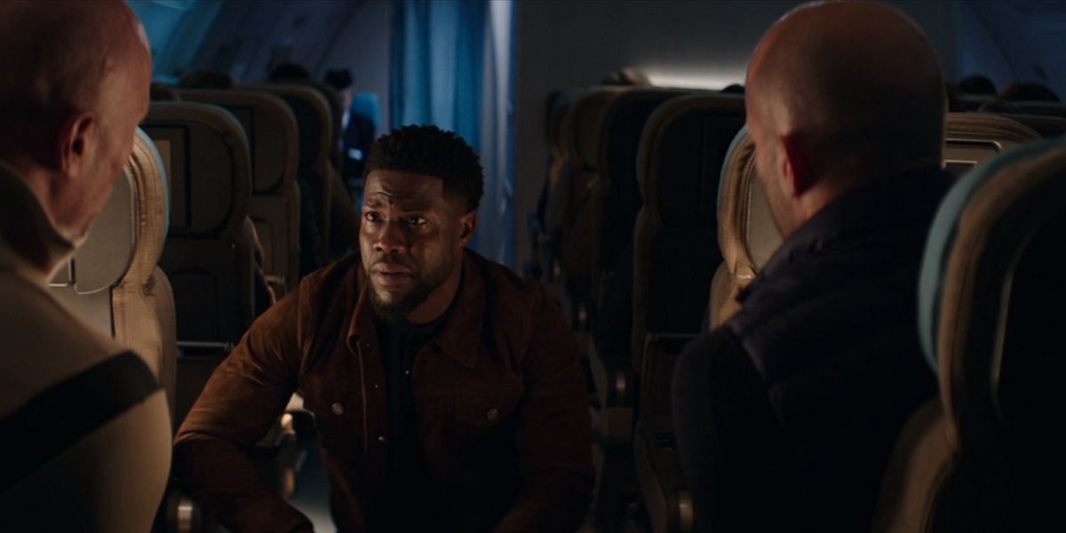 Dwayne Johnson and Jason Statham in a scene from the film &#039;Hobbs &amp; Shaw&#039; (2019) with Kevin Hart (Image via Universal Pictures)